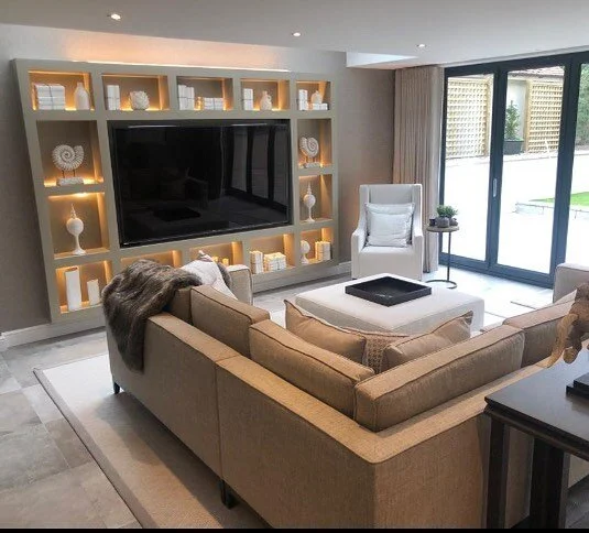 This is a project we finished last year. The client wanted a light filled sitting area opening on to the garden. He also wanted to be able to seat 12 people for dinner, so in addition to his circular 6 seater table, we sourced a console table that op