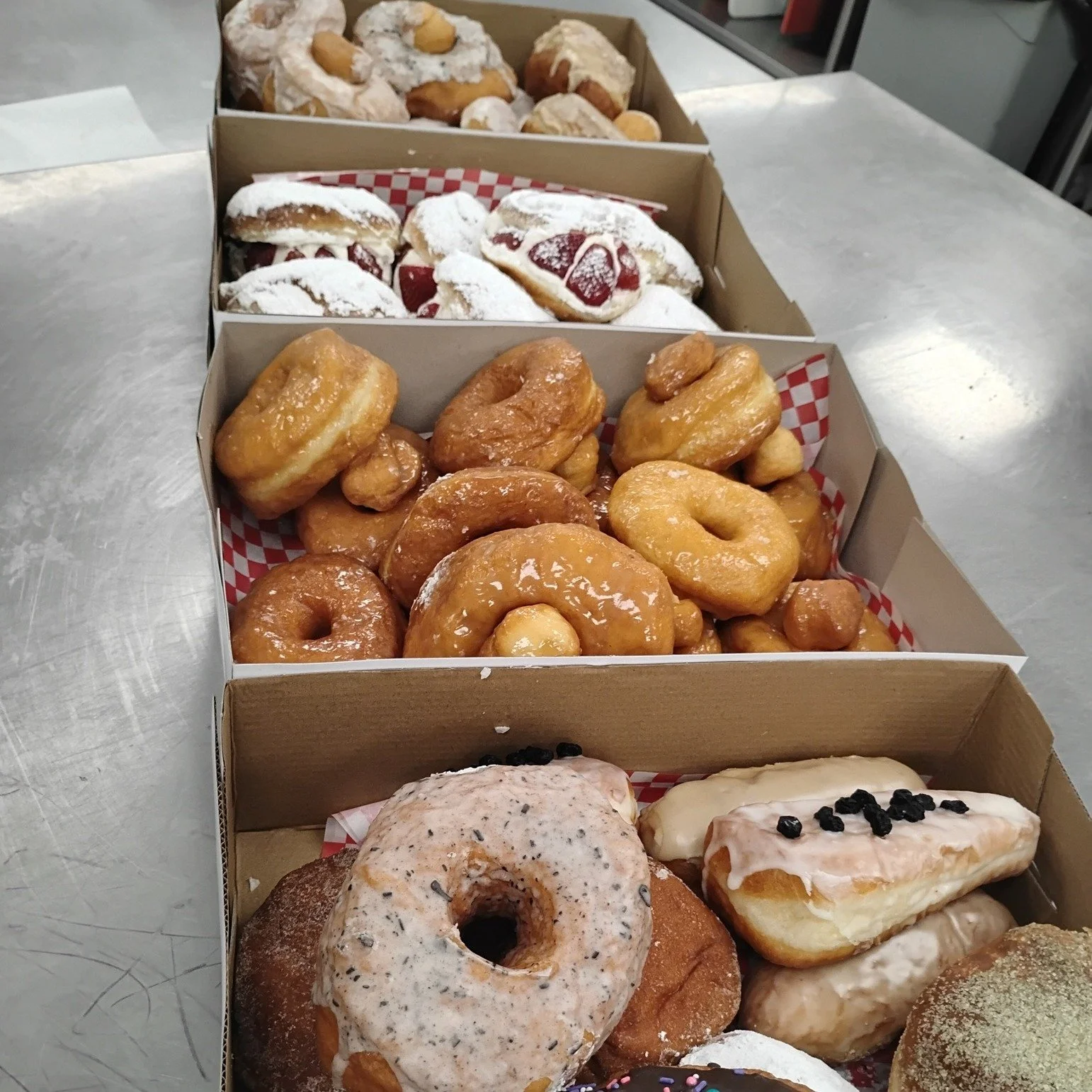 @dillydallydonutbar  left Fork &amp; Spoon a wonderfully sweet surprise!
They are busy making these delicious donuts in our commissary kitchen!