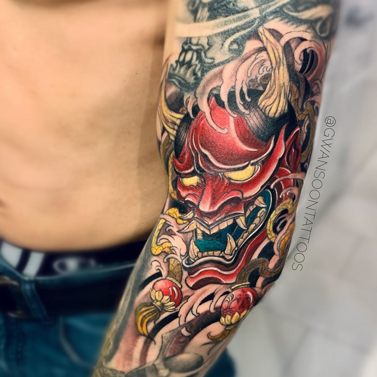 Oni mask tattoo design to complete Adane&rsquo;s sleeve 👹 Parts healed and fresh. Thanks Adane! _________________________________________________ 

Follow us @gwansoontattoos ✍🏼

Artist - @jina.gwansoontattoos
______________________________________