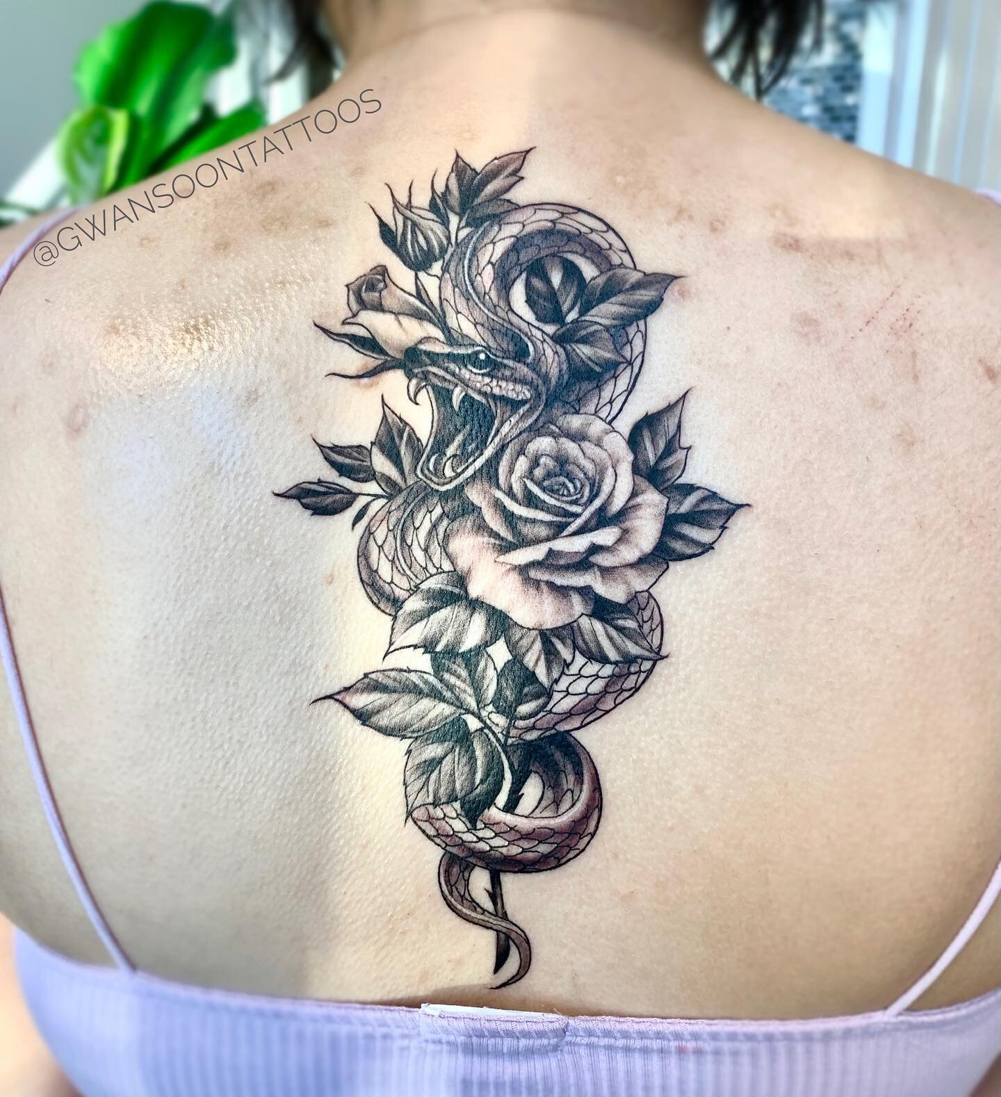 Snake &amp; Roses tattoo design done on back 🐍 _________________________________________________ 

Follow us @gwansoontattoos ✍🏼
_________________________________________________

☎️ 1-416-909-9055
📩 info@gwansoonleetattoo.com
🖥 www.gwansoonleeta