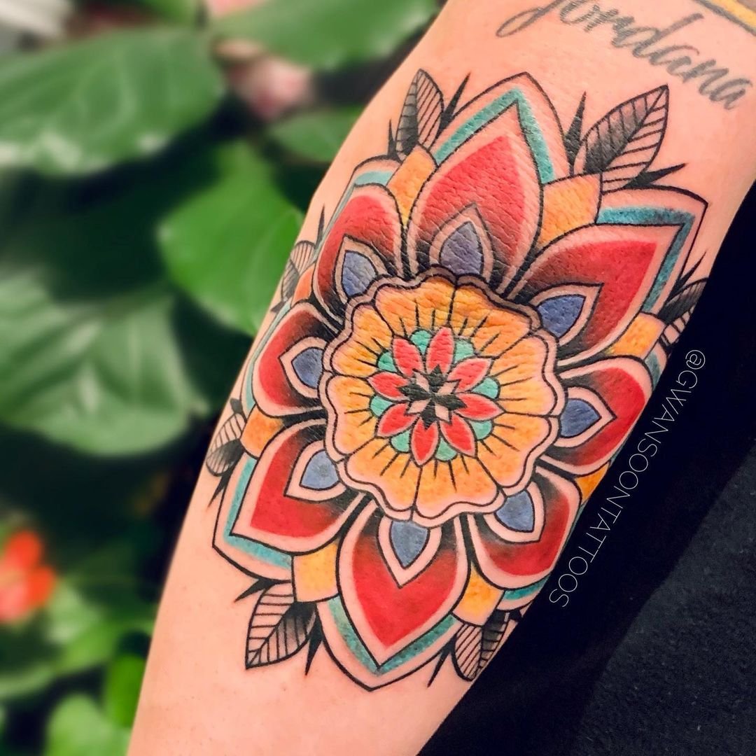 Black traditional mandala tattoo on the arm  Tattoogridnet