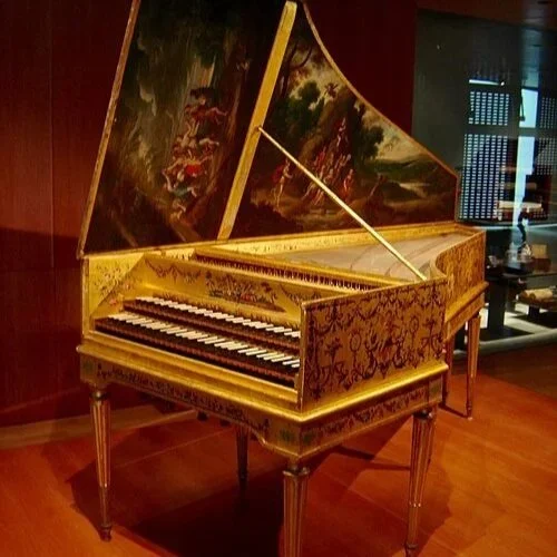 This harpsichord is the work of two celebrated makers: originally constructed by Andreas Ruckers in Antwerp (1646), it was later remodeled and expanded in a process called grand ravalement by Pascal Taskin in Paris (1780).