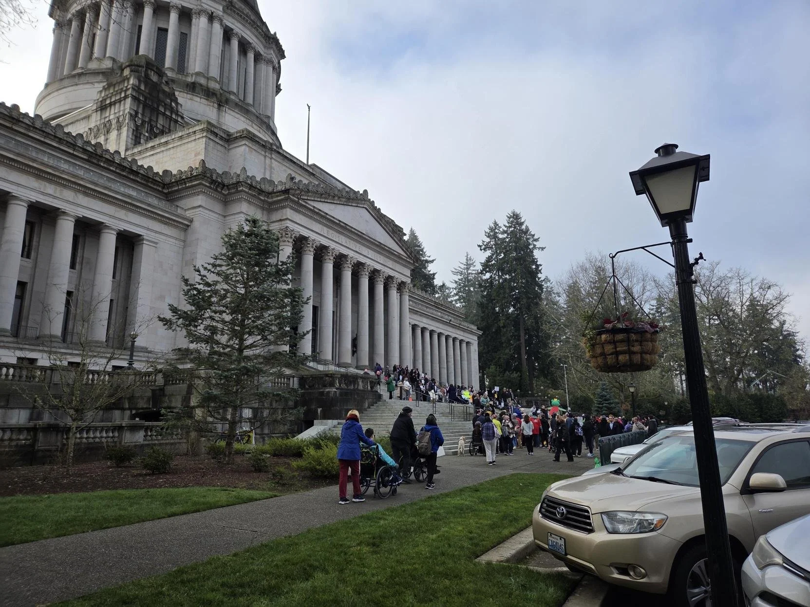 An image of the peaceful rally on the steps of the Washington State Capitol Building steps