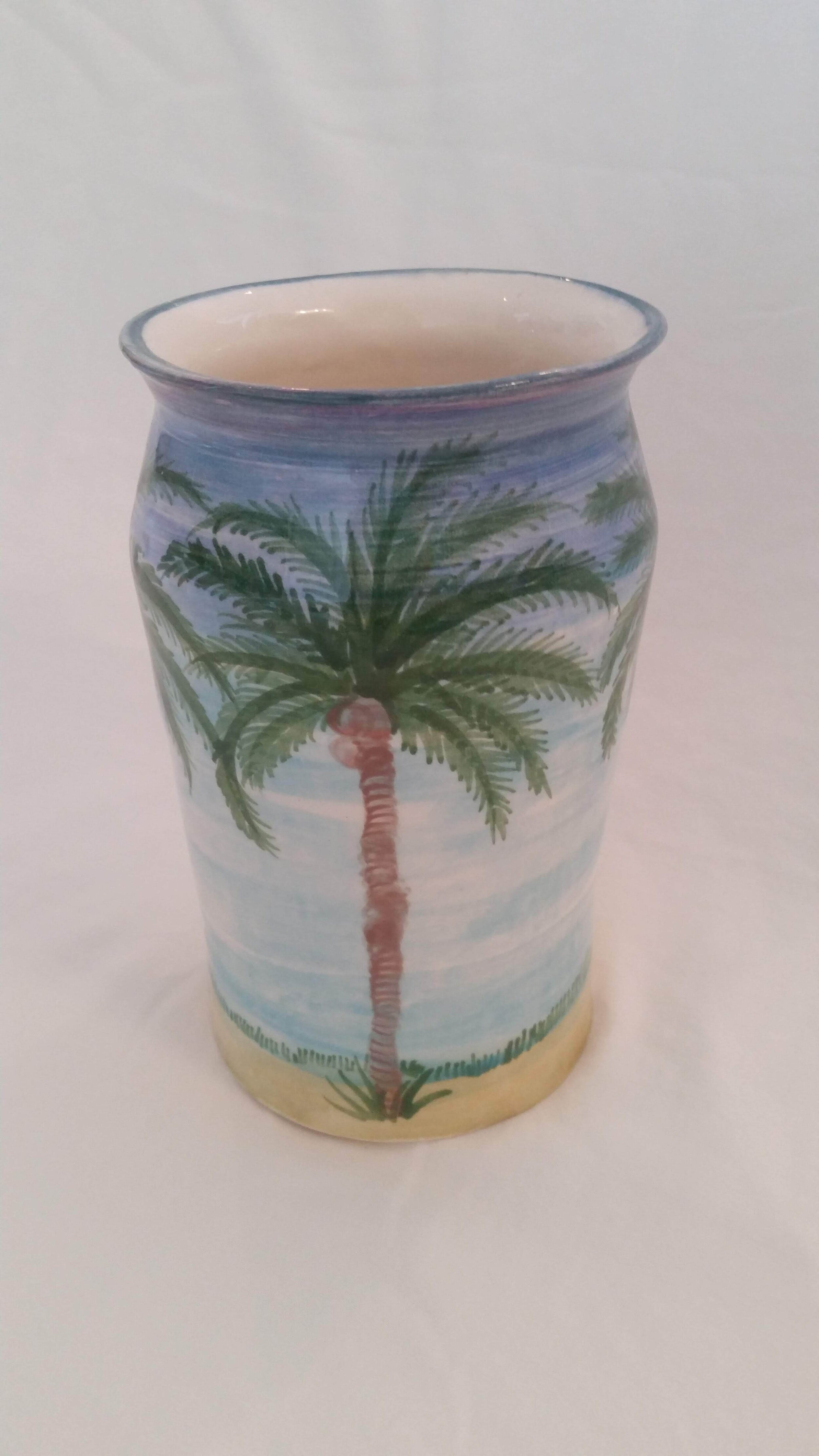 Hand thrown and painted by the artist