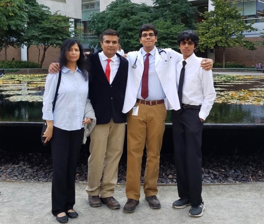Srini with family, at a White coat ceremony for his son