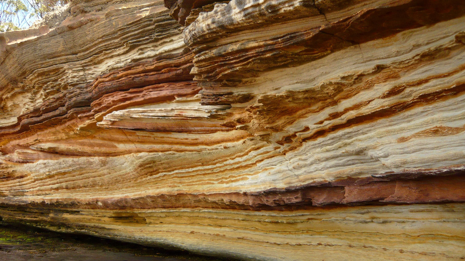 Sedimentary basins that exist over vast sections of Earth’s surface are formed by long-term subsidence of continents due to tectonic extension, which creates accommodation space for infilling sediments that are eroded from nearby mountain ranges. Over time, natural resources then accumulate within these basins by various geological processes. Pictured: Cross-bedding in Permian fluvial sandstones on the Tasman Peninsula, Australia. These sandstones were deposited by east flowing rivers in Gondwanaland and include the Cygnet Coal Measures, which originated from Permian rainforests. Image: Prof Dietmar Müller .