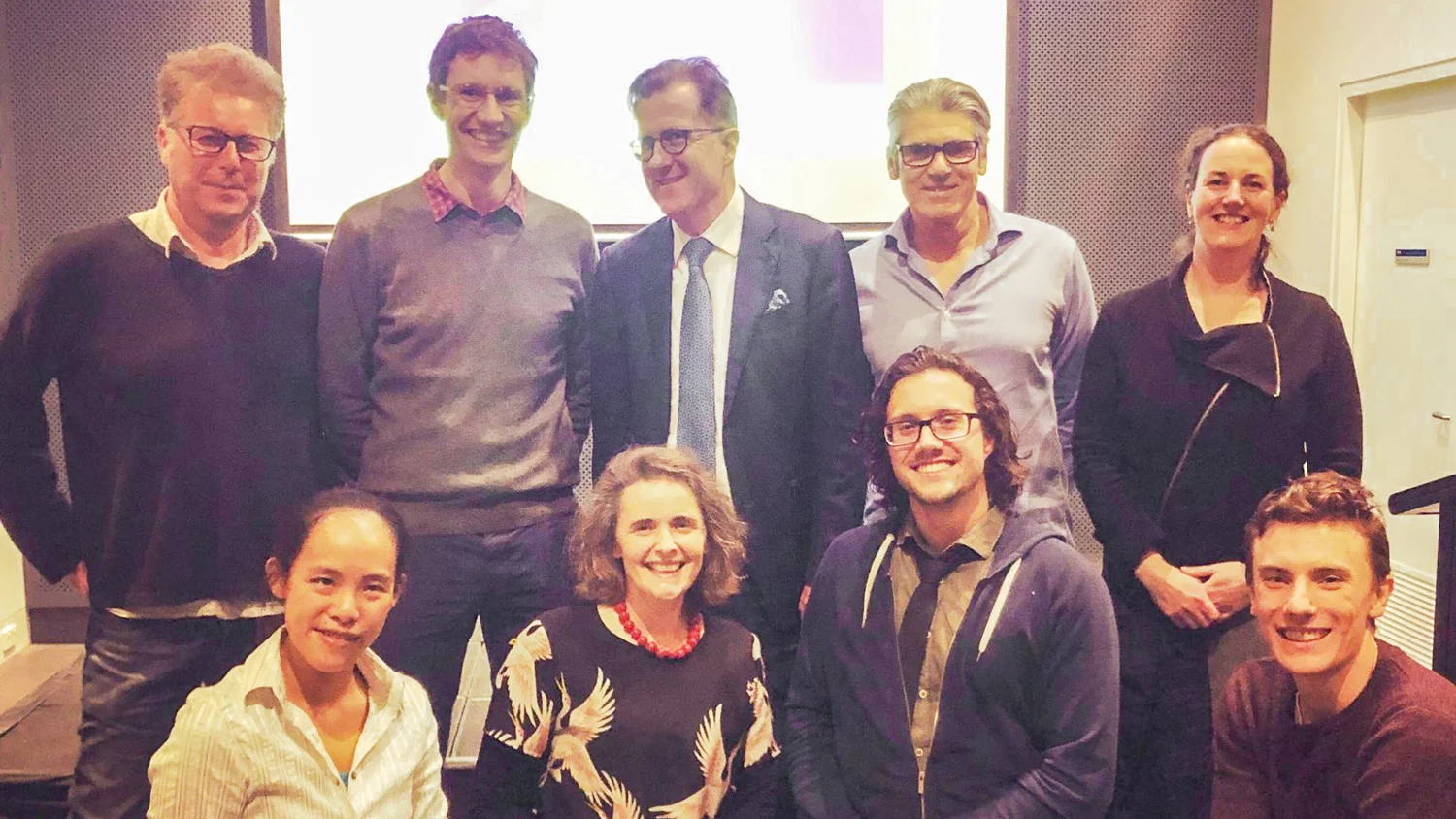 Academics and students pose for a pic after the 2019 Three Minute Thesis presentation at The University of Melbourne. Back row, L-R: As Prof Andy Martin, Prof James McCaw, Prof Aleks Owczarek, Dr Graham Phillips and Dr Robyn Schofield. Front row, L-R: Dr Wing Chan, Dr Jen Martin, Runner-up Giles Adams and Rohan Byrne. Image: Rohan Byrne.