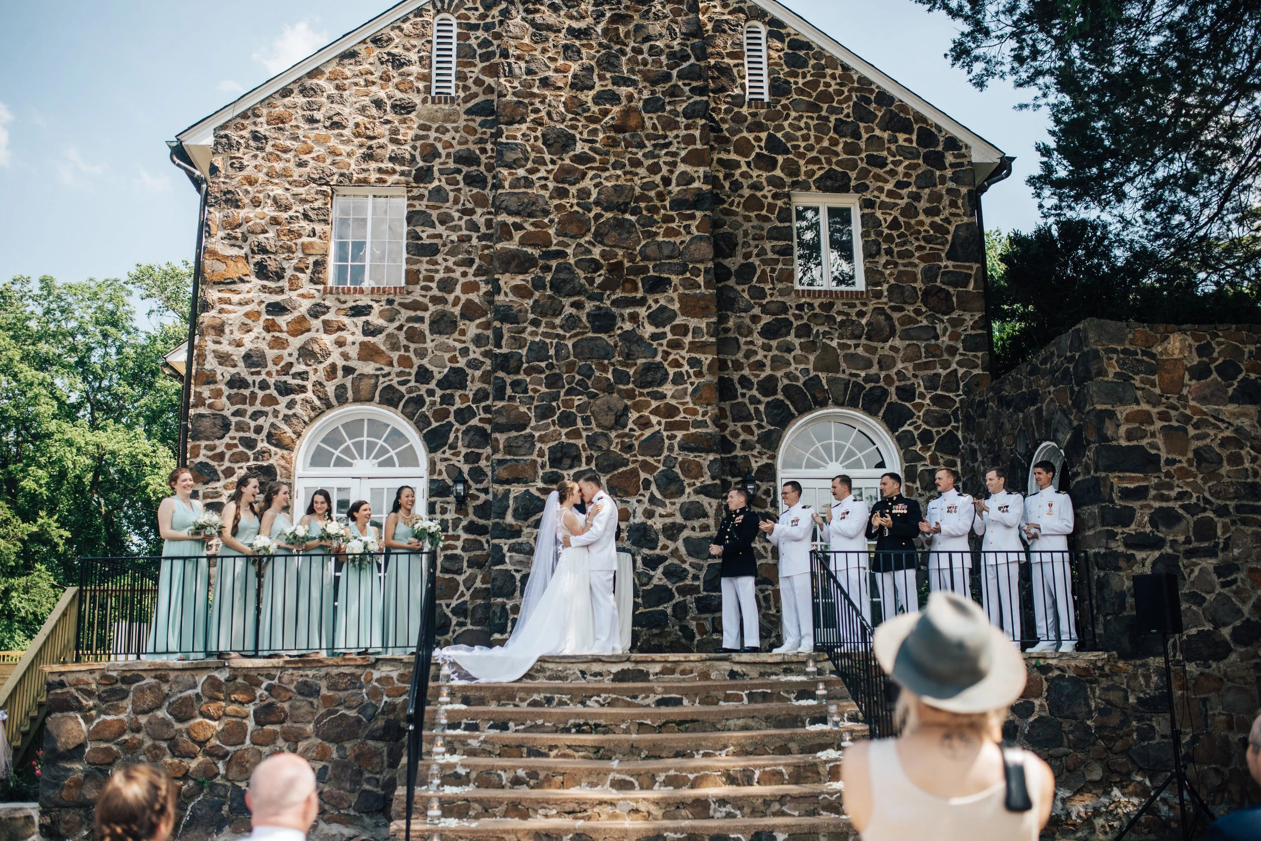 ceremony outside with building in background.jpg