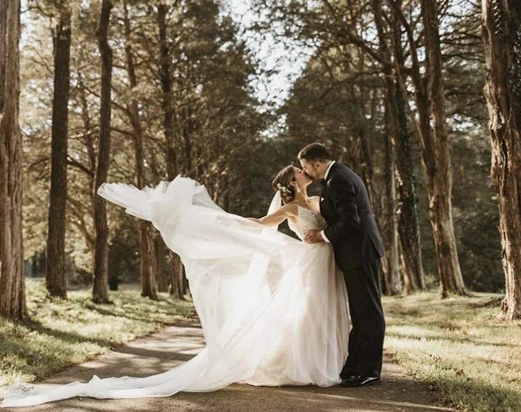 couple outside with flowing dress.jpg