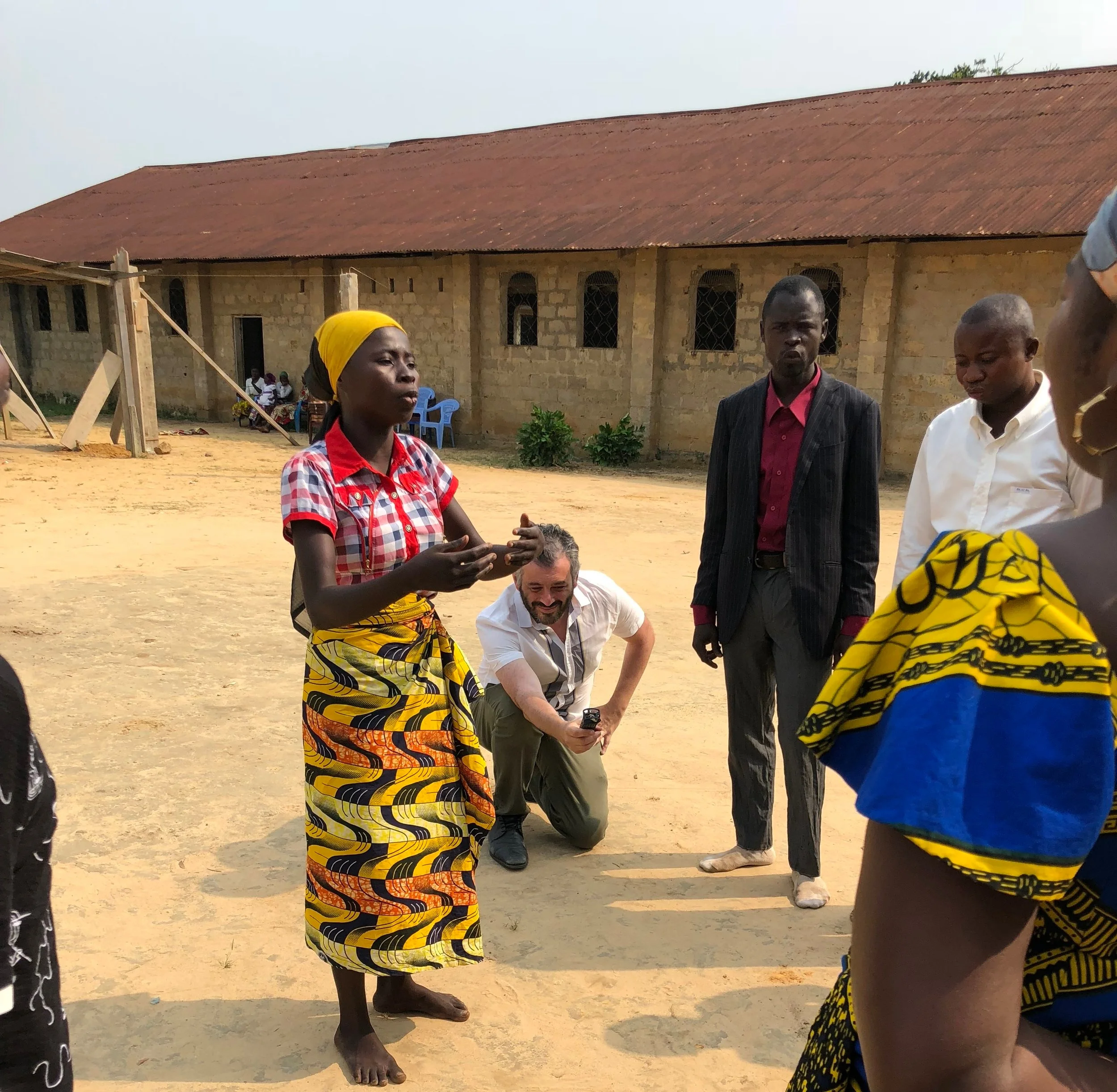 Recording an amazing choir at the secretive Kimbanguist church in Bandundu, Democratic Republic of Congo. One knee in the dirt, recording - my happy place!