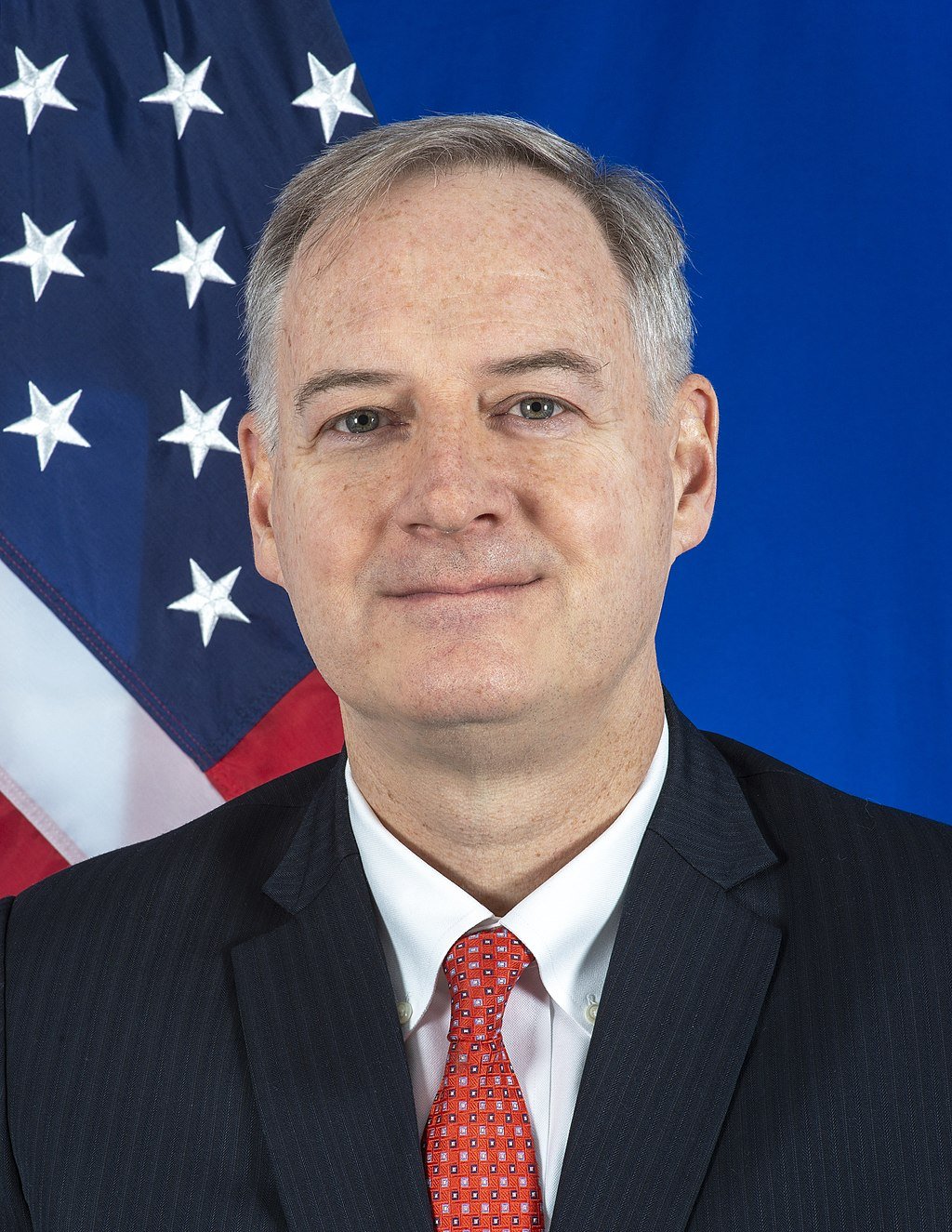 Amb. Chris Henzel