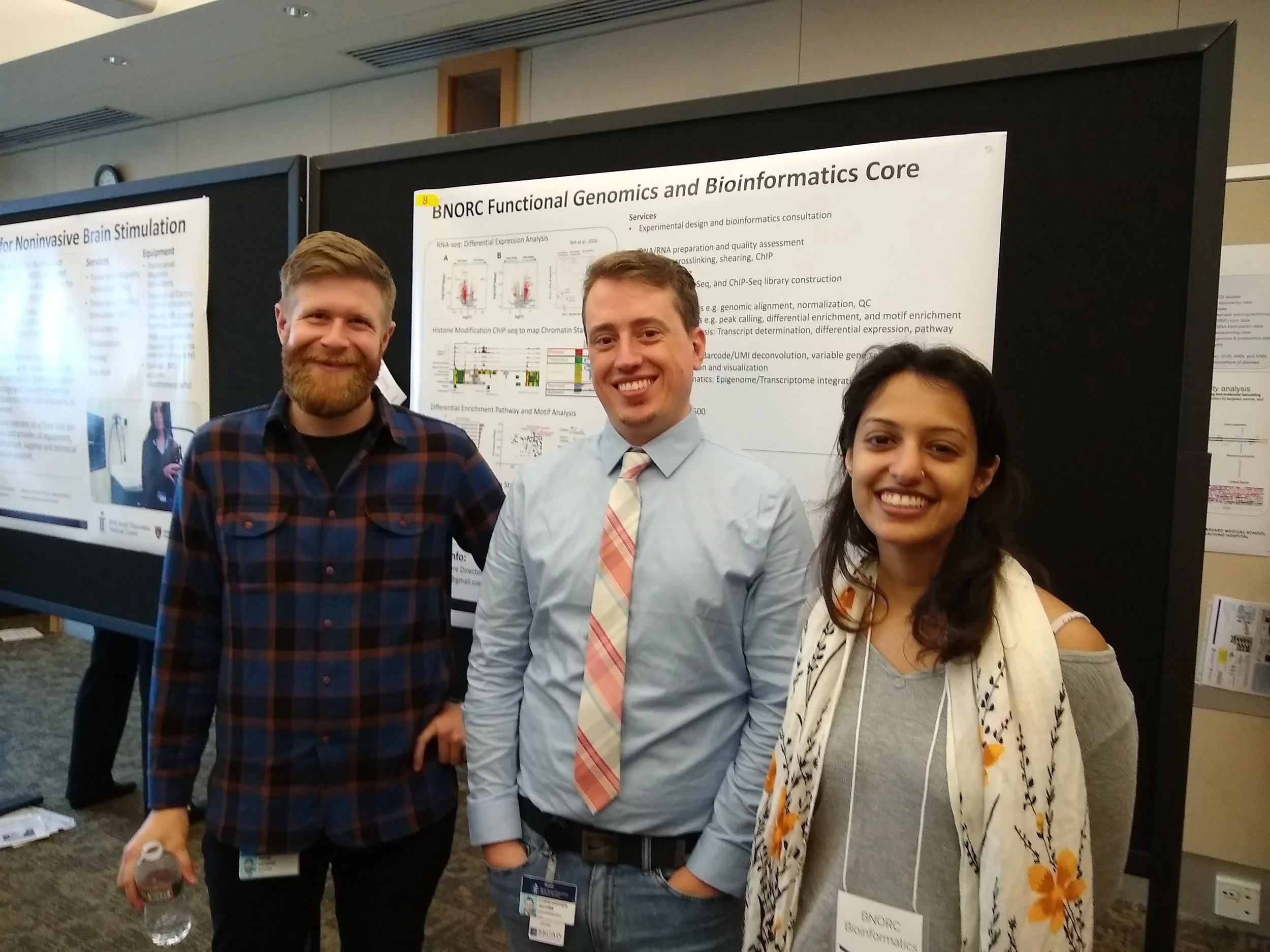 Adam, Chris, and Deepti representing