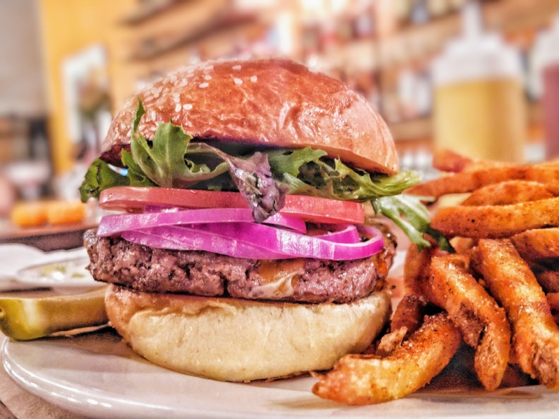1/2 LB Burger on a homemade Brioche Bun with Lettuce, Tomato, Onion and Cheddar with Twice Cooked Fries with Worcestershire Aioli from Molly’s Restaurant.