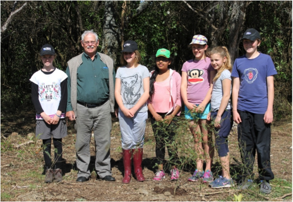 Ian Jenkins with some of the Hilltop Weedbusters