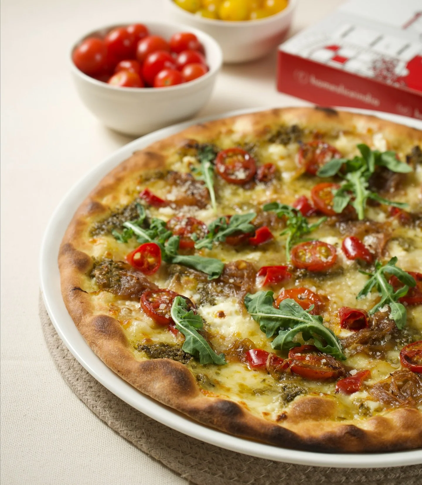 Dine In :: Home Delivery
Our New Pesto pizza is minus the pizza sauce . It’s got a basil pesto base with several different types of cheese and fresh tomatoes .
Choose your base - Thin crust or Neapolitan-ish or Gluten free and try it .
Kolka