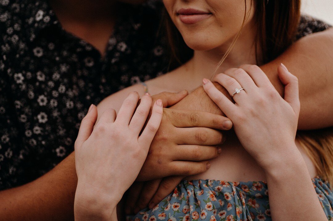 Ways we say I love you - with our words, with a kiss, with a look and with our hands.
Hands can communicate so much.  These hands say I'm never letting go.

#engagementphotos #holdingtight