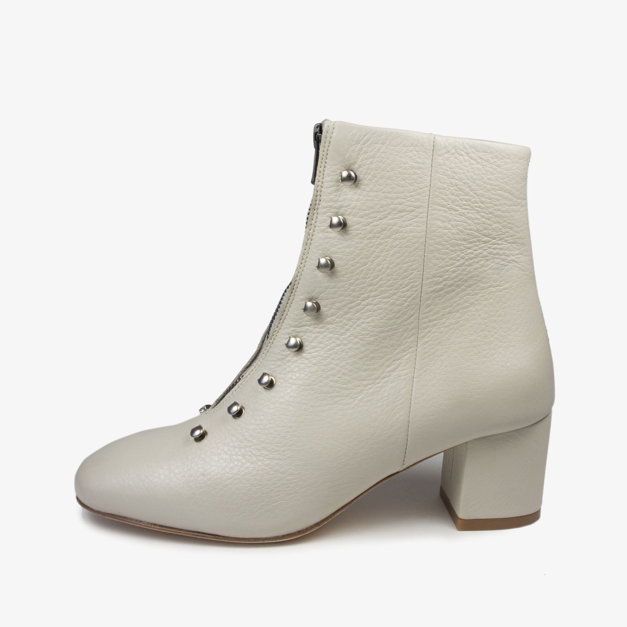 zipped white boots with metal hooks