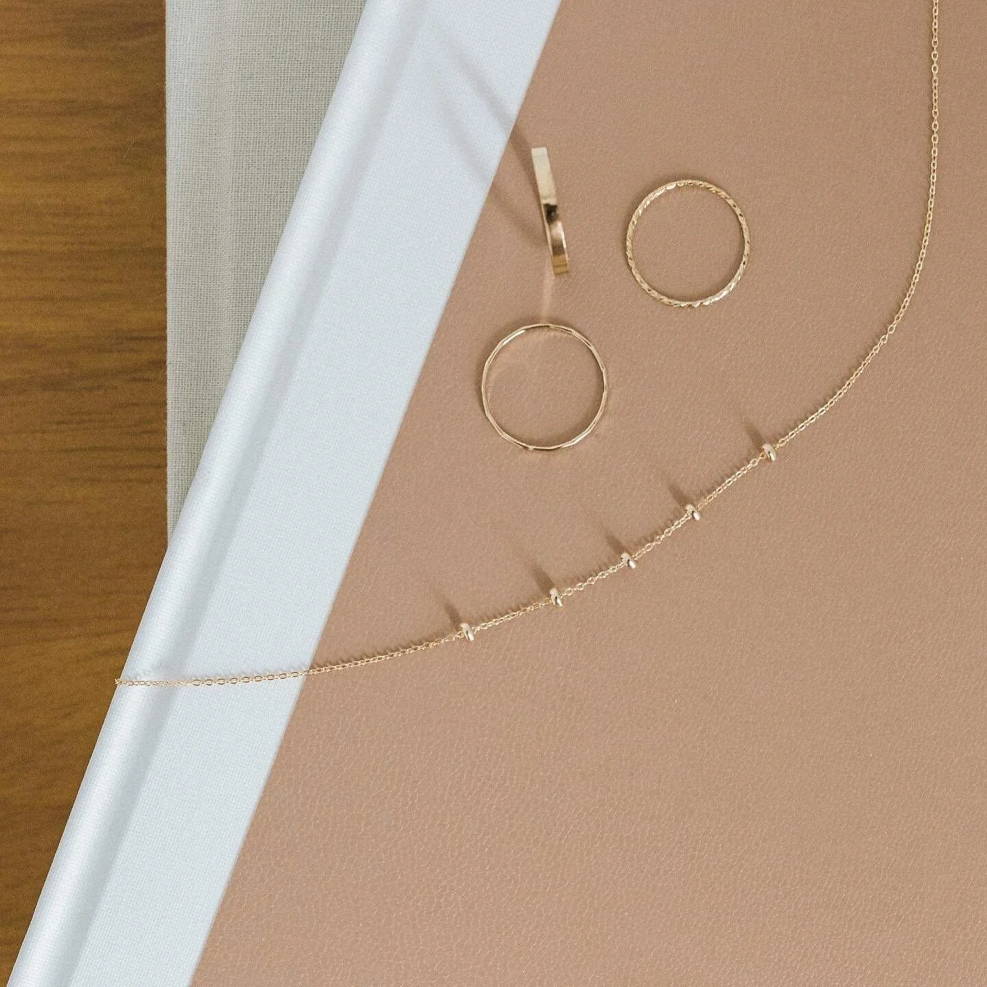 Refined Essentials. Featured in our Two Tone 5 Rondelles Necklace 14k Gold Filled Thick Band Ring 14K Gold Filled Diamond Cut Band Ring 14k Gold Filled Hammered Band Ring Learn more &mdash; tap for details or link in bio @thesisofalexandria 📸: @voya