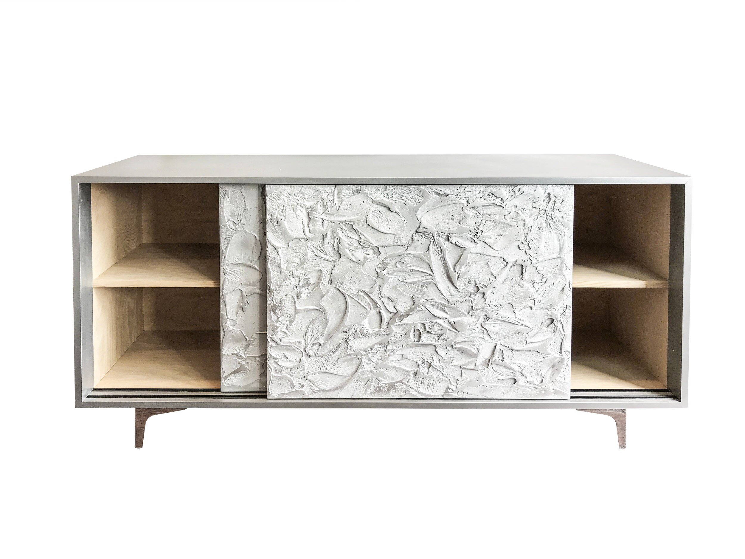 A custom-made sideboard featuring a textured white sliding door. This modern cabinet showcases open shelving on either side, with a light wood interior.