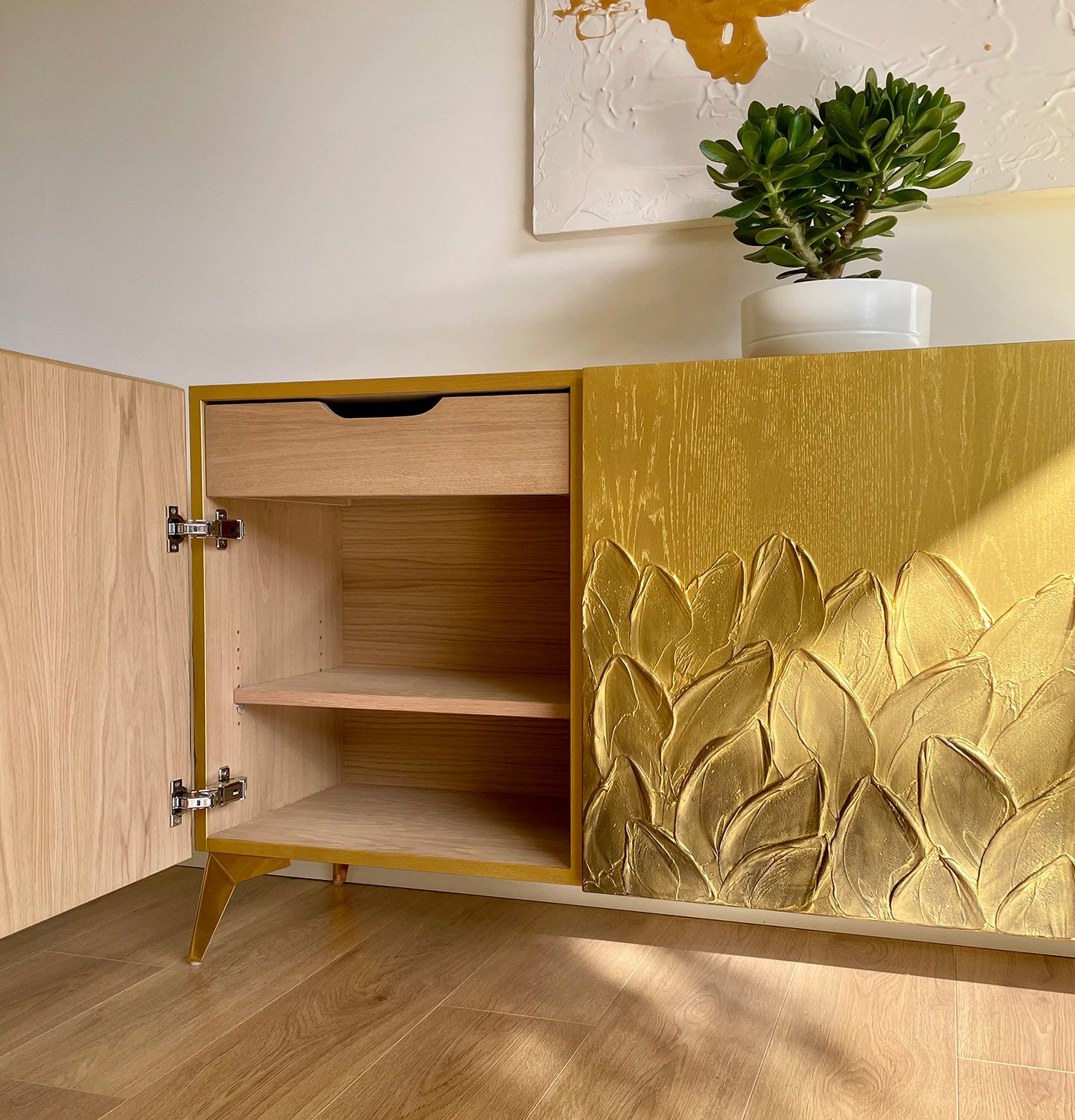 Internal view of the sideboard storage showcasing a smooth-gliding oak drawer for luxury organisation.