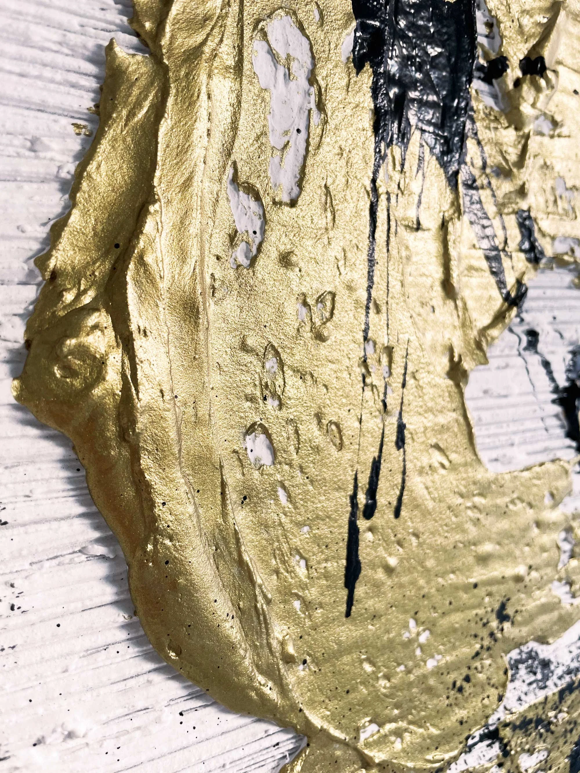 Luxury abstract art featuring bold gold and black design.