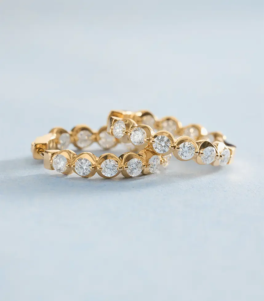 Yellow_gold_diamond_rings_with_illusion_settings._.webp