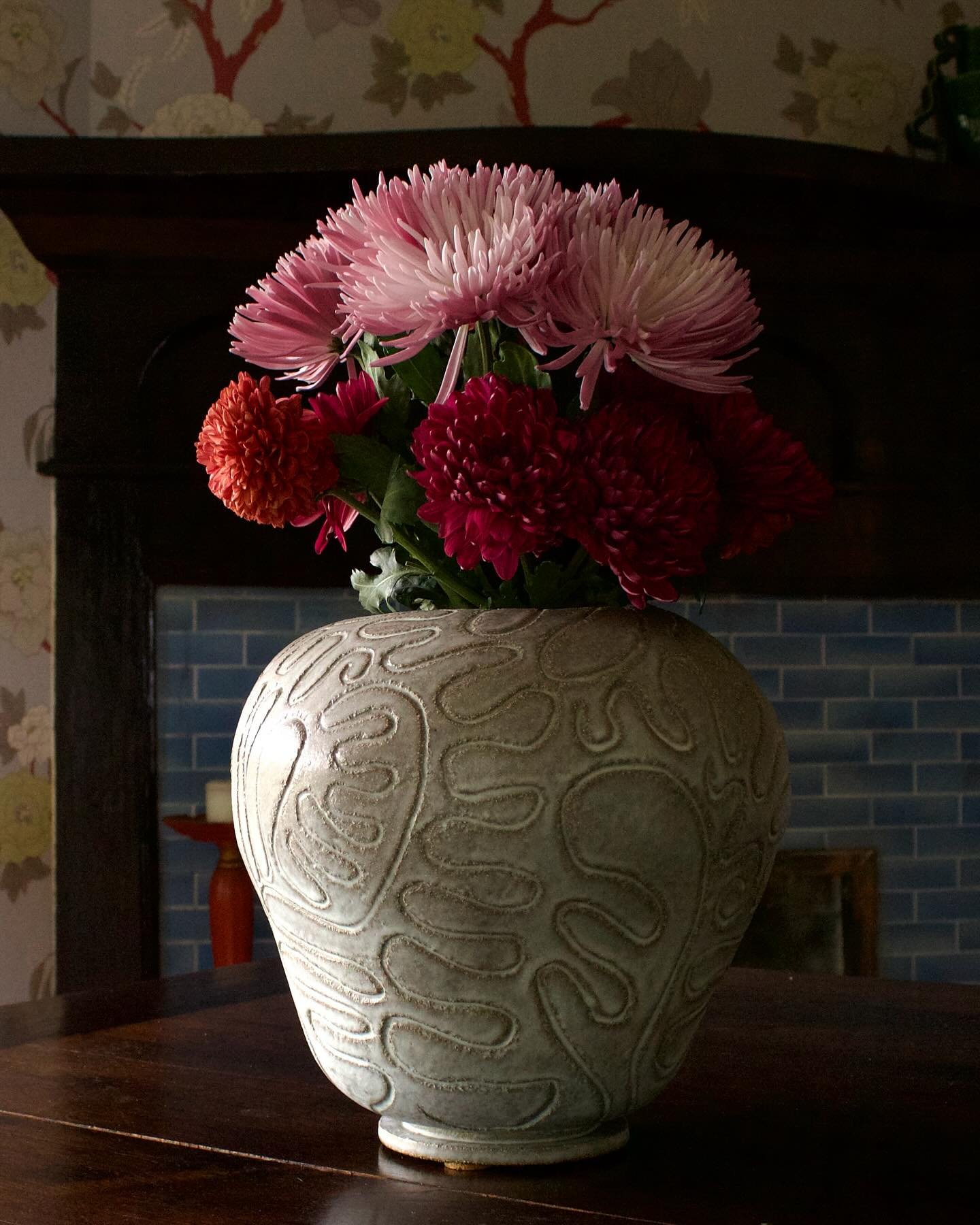 Limited Edition Vermicular Globe Vase. This design came out of an obsession with the curling, but never crossing, textile texture. Usually a thin cord stitched onto crepe dresses with matching jackets, it has always hit me hard, making we want to buy