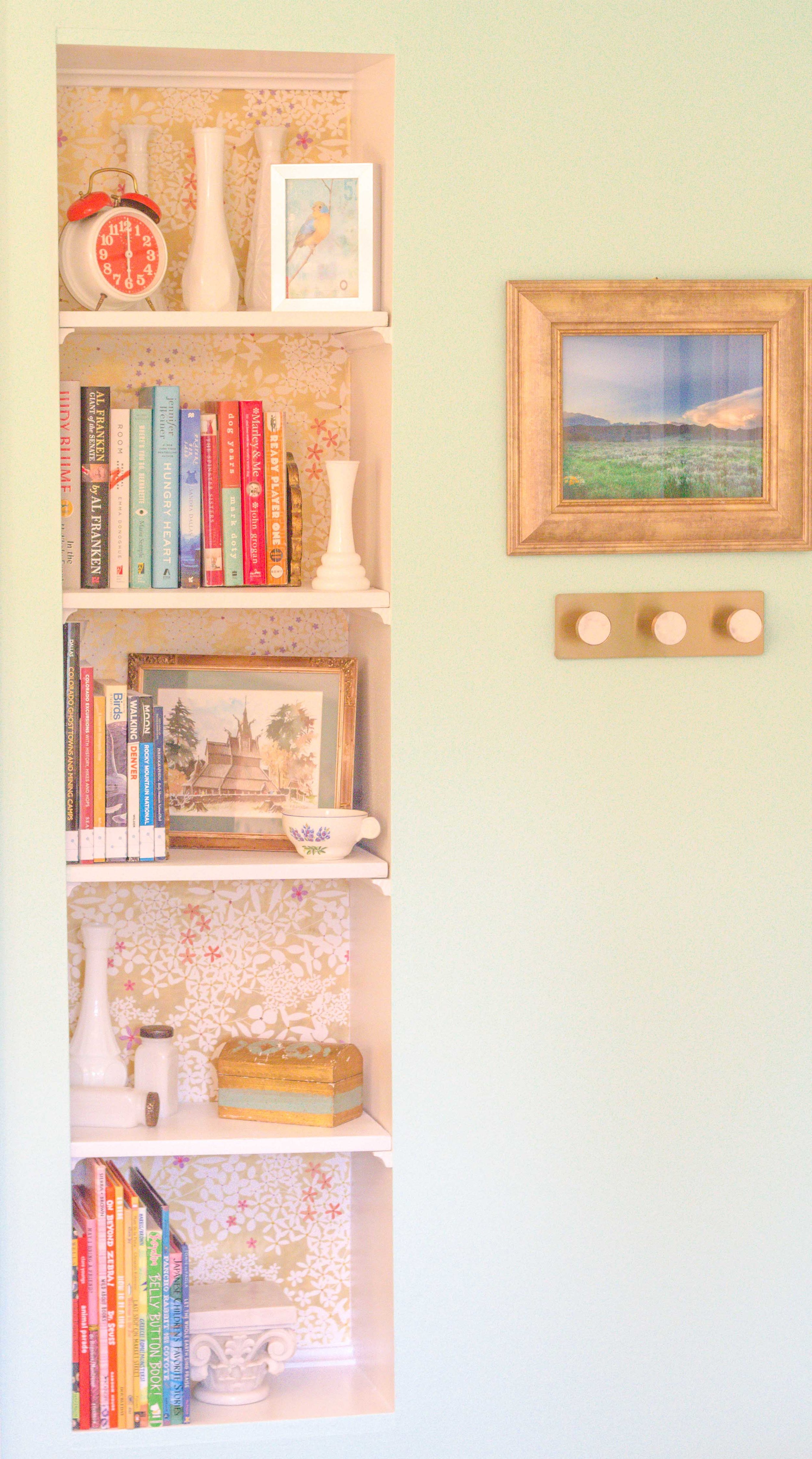 My new pantry shelves lined with wrapping paper from Michaels