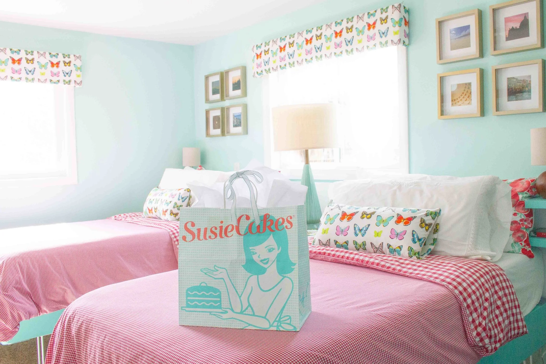 When I described my vision for a retro-inspired room with a red and turquoise color scheme, my husband immediately said, “Oh, it will look like a Susie Cakes bag!” What do you think? Hopefully our Guest Room Refresh is as sweet as the treats at our favorite San Francisco bakery!