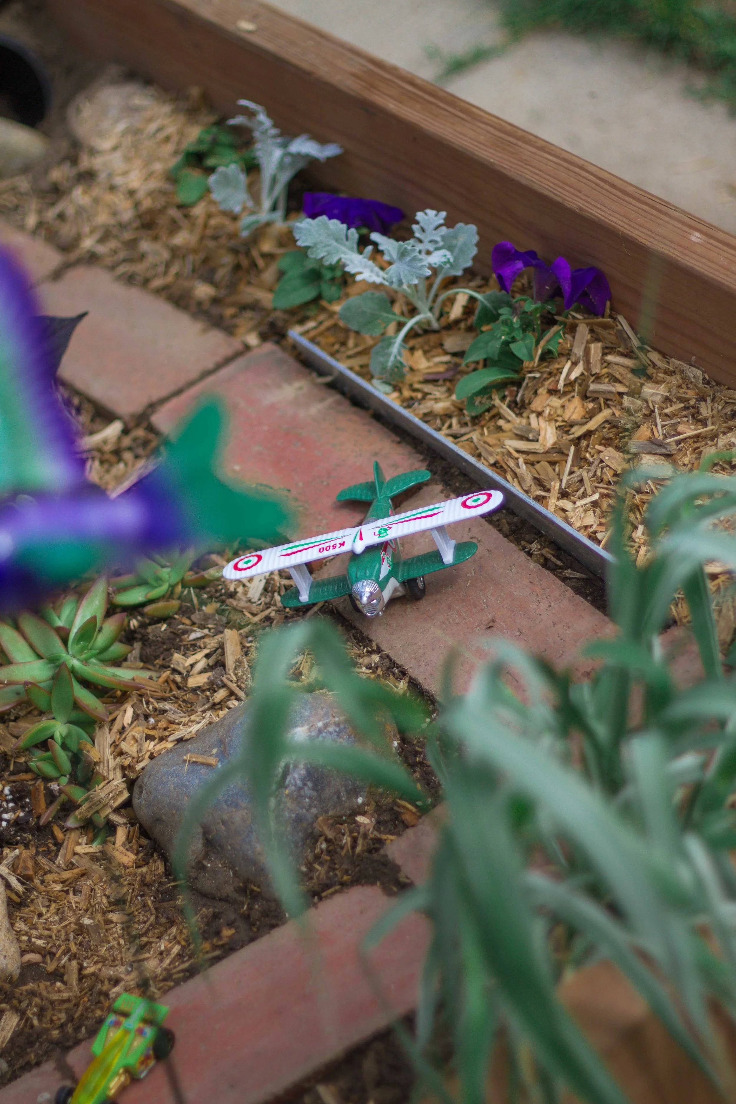 Create an outdoor place where your child can play and garden, too. Call it a Dinosaur Garden, Fairy Garden, or just a great play area, this easy DIY project is full of backyard ideas. Perfect for patios or small yards, this project can be as small or as large as you want. And kids will love to dig, plant, and create in their own special gardening space. Also: vegetables, flowers, toys, pots.