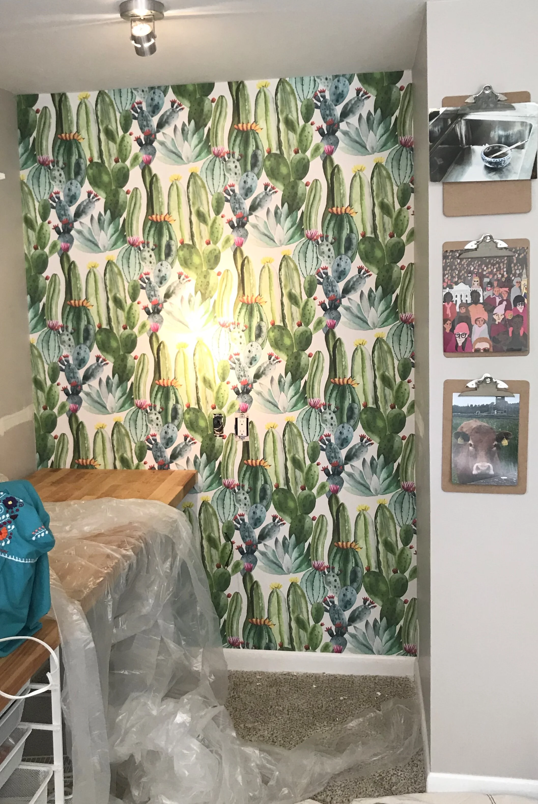 A workroom makeover that is so much more. Part home office, part library, part sewing room, craft room, and art studio, this Workroom space has many functions which means the design, organization, and decor of this renovation must all be on point. And this renovation includes tips for making any remodeling project greener and more eco friendly. Also: how to install IKEA Billy bookcases, fill holes