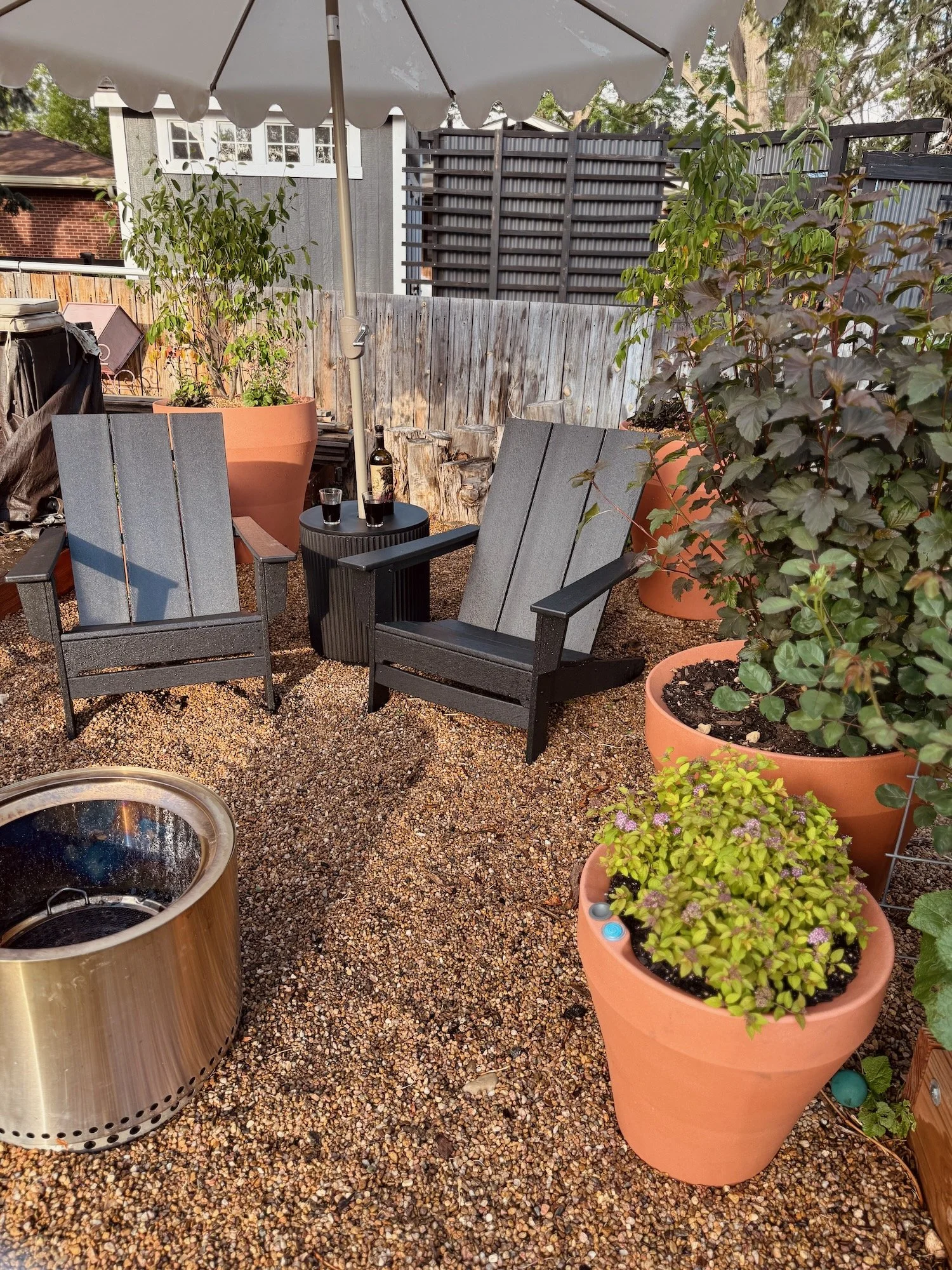 Pots define The Courtyard's boundaries