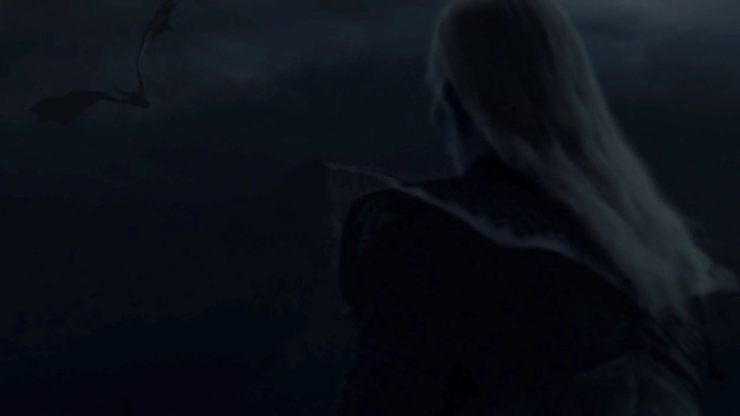 A dragon’s dark silhouette emerges in a (relatively) light strip of the sky, its power and speed juxtaposed with the eerie calm of the white walker whose pale hair and skin break the darkness on the opposite side of the screen.