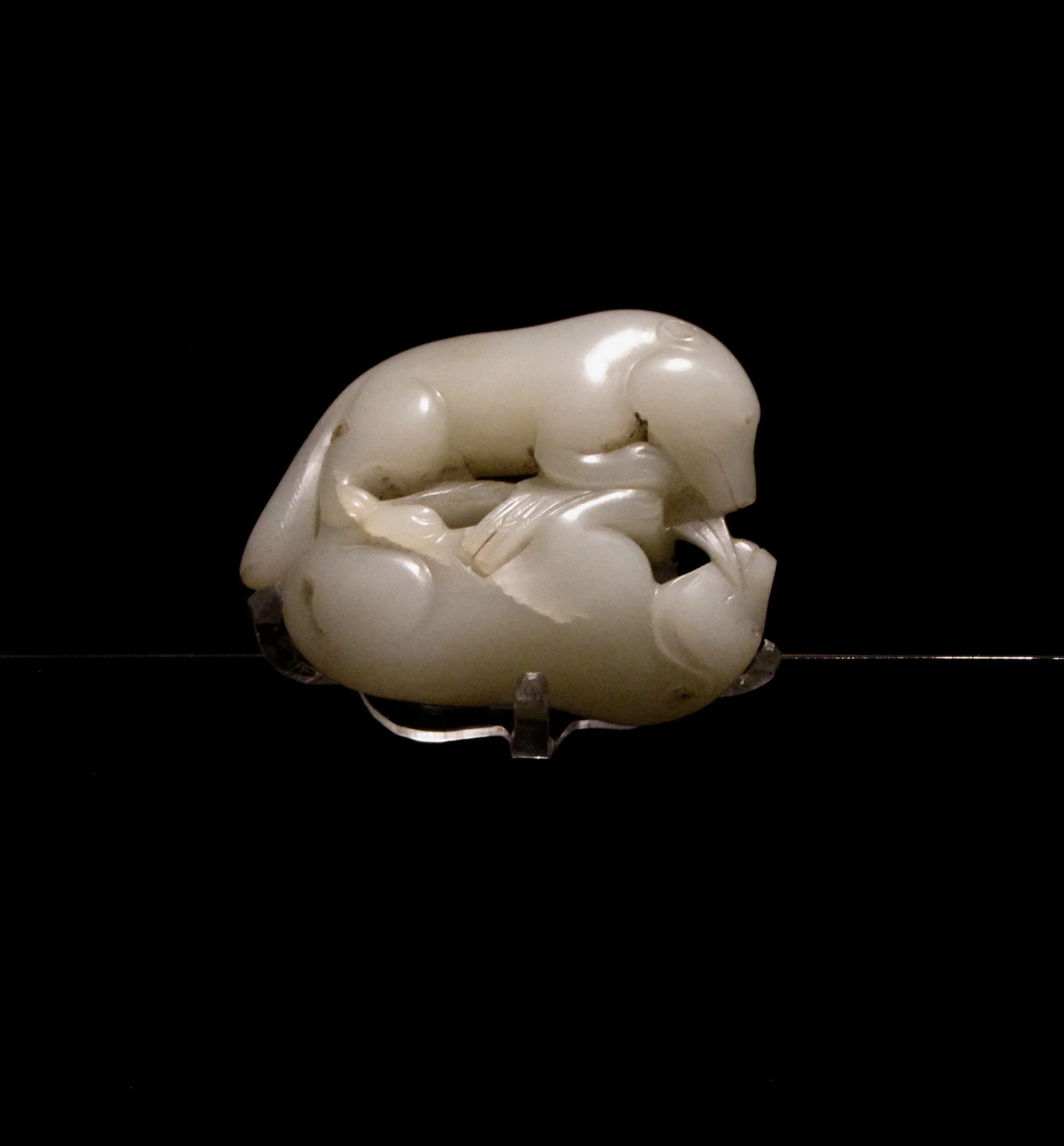 Double-badger-shaped jade pendant. Capital Museum, Beijing. Photo by Renée DeVoe Mertz.