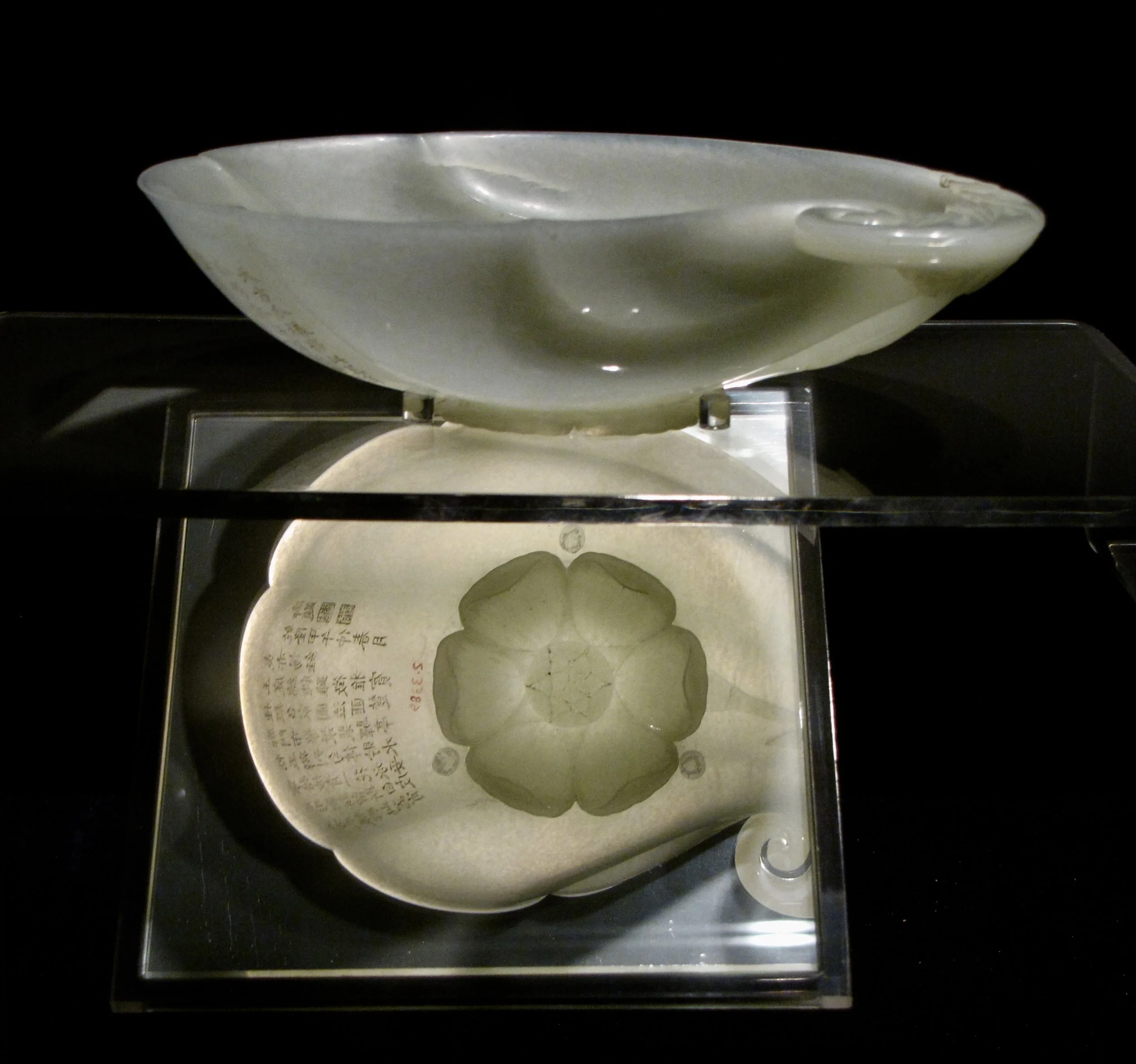 Jade washer engraved with a poem by the Emperor (1736–95). Capital Museum, Beijing. Photo by Renée DeVoe Mertz.