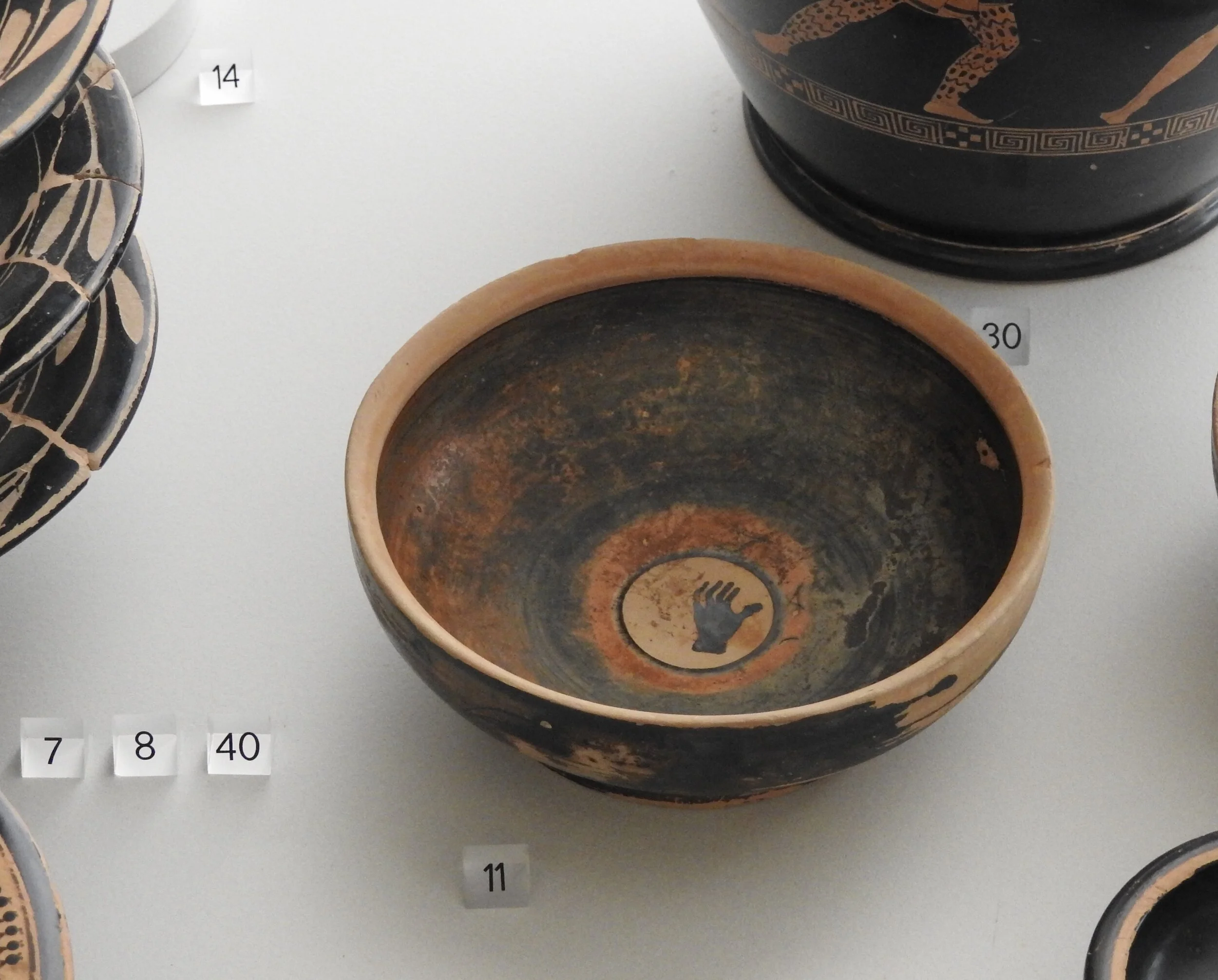 Black glazed bowl from Valle Pega’s Tomb 18C, ca. 450–430 CE. Museo Archeologico Nazionale, Ferrara. Photo by Renée DeVoe Mertz.