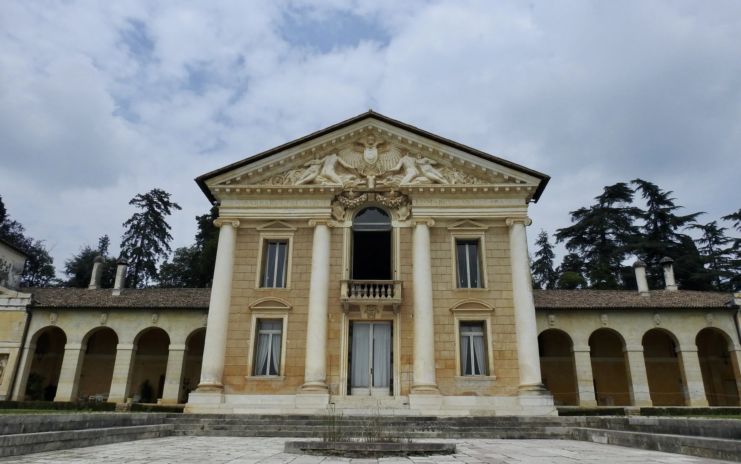 The central structure of Villa Barbaro, decorated with high-relief sculpture and giant, two story columns supporting a flat portico.