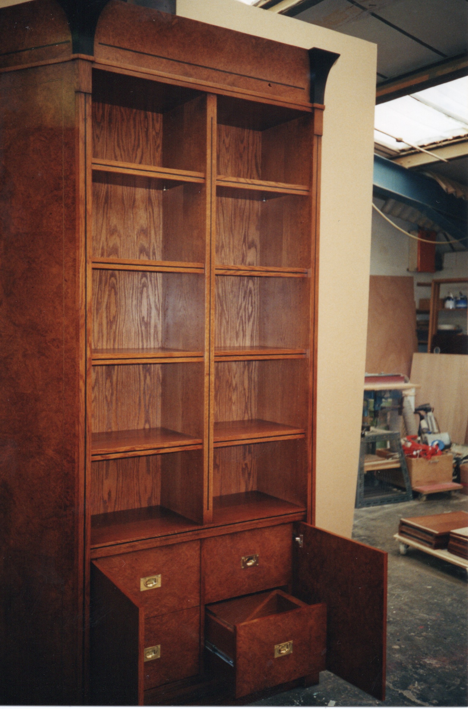 Crown & burr Oak library cabinet with part ebonized cornice