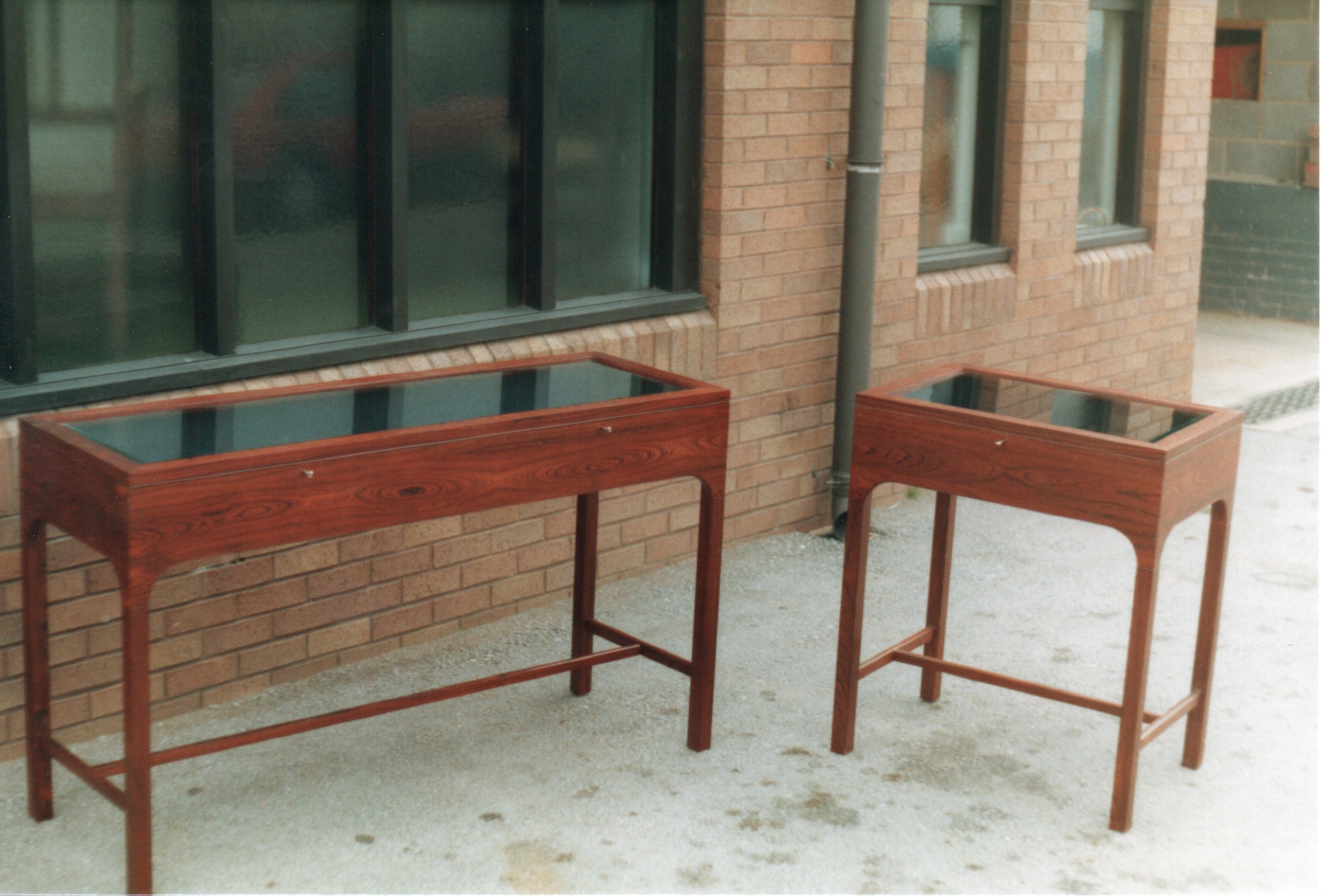 Rosewood display cabinets