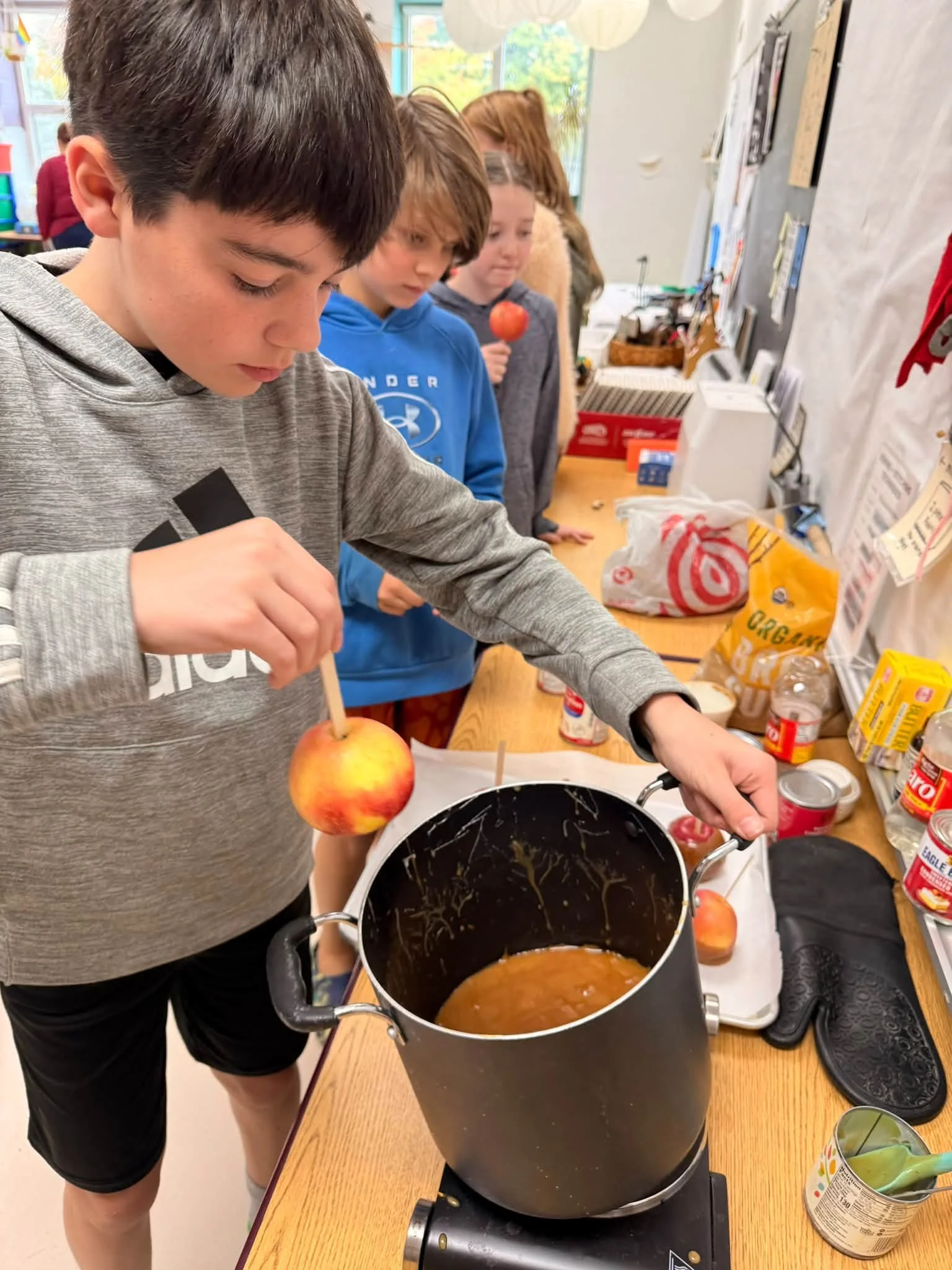 Sallie&rsquo;s and Sophie&rsquo;s classes make carmel apples in the studio. Some students measures and poured ingredients, others took turn stirring, but everyone got to hand dip their apple. 🍎 

These fun and tasty shared experiences are helping to