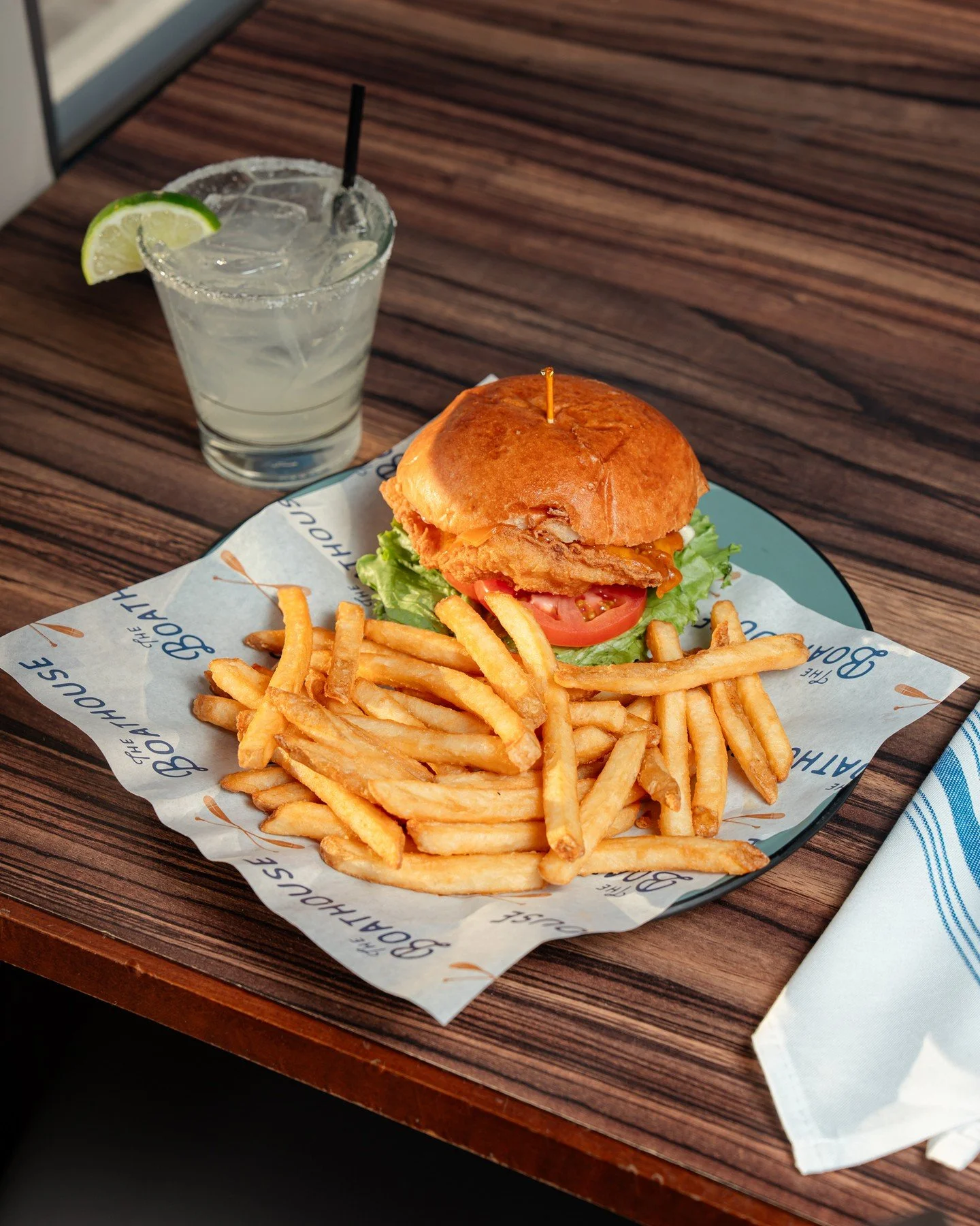 Crispy, fresh, and made for pairing 🍋🍔 The Cod Sandwich on brioche with tartar, lettuce, tomato &amp; cheddar... best enjoyed with a marg in hand 🍹✨