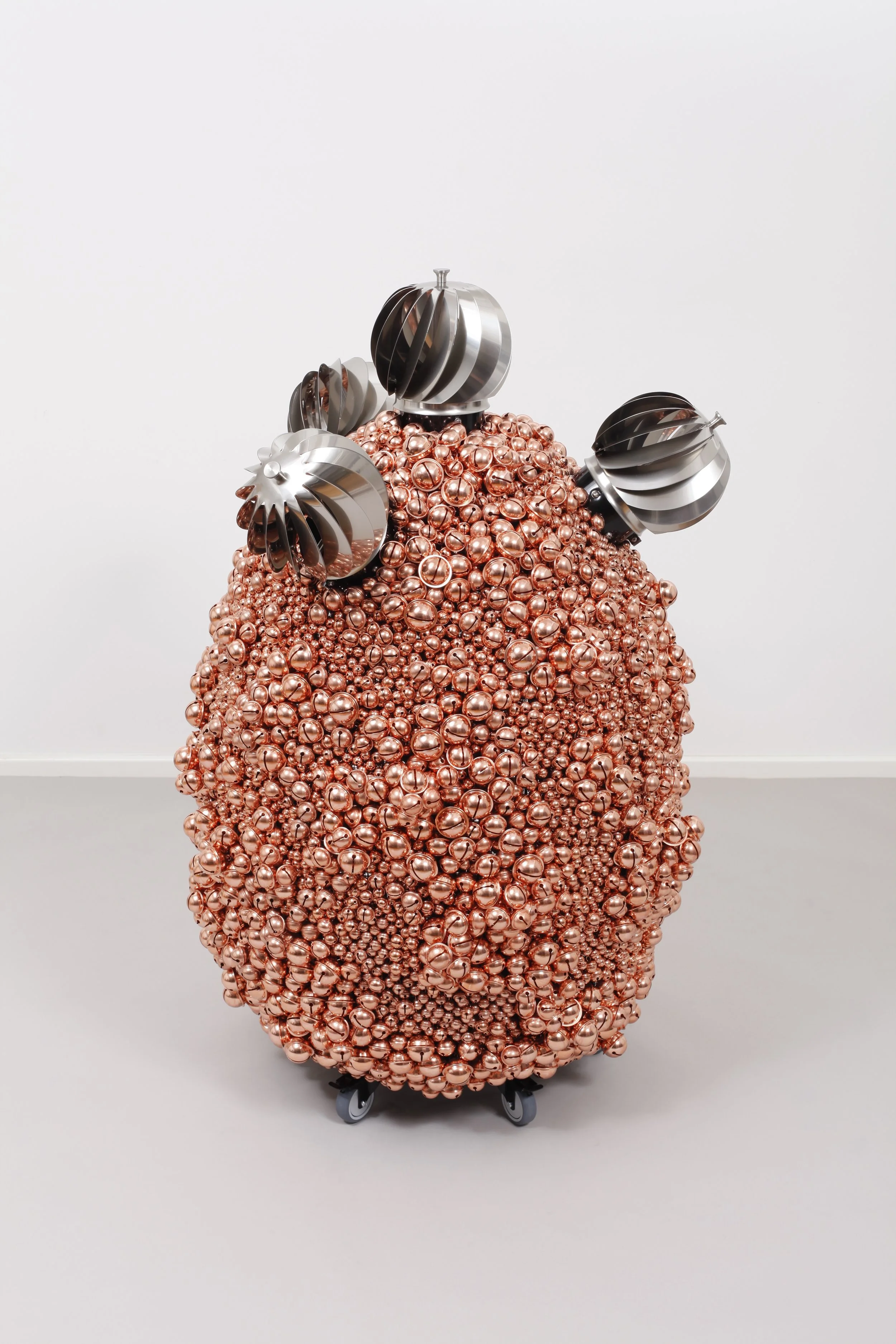  Haegue Yang,  Sonic Egg with Enthralling Tetrad – Copper Crater , 2016, Steel stand, metal grid, powder coating, casters, copper plated bells, metal rings, turbine vents, 52.36 x 30.31 x 34.25 inches 