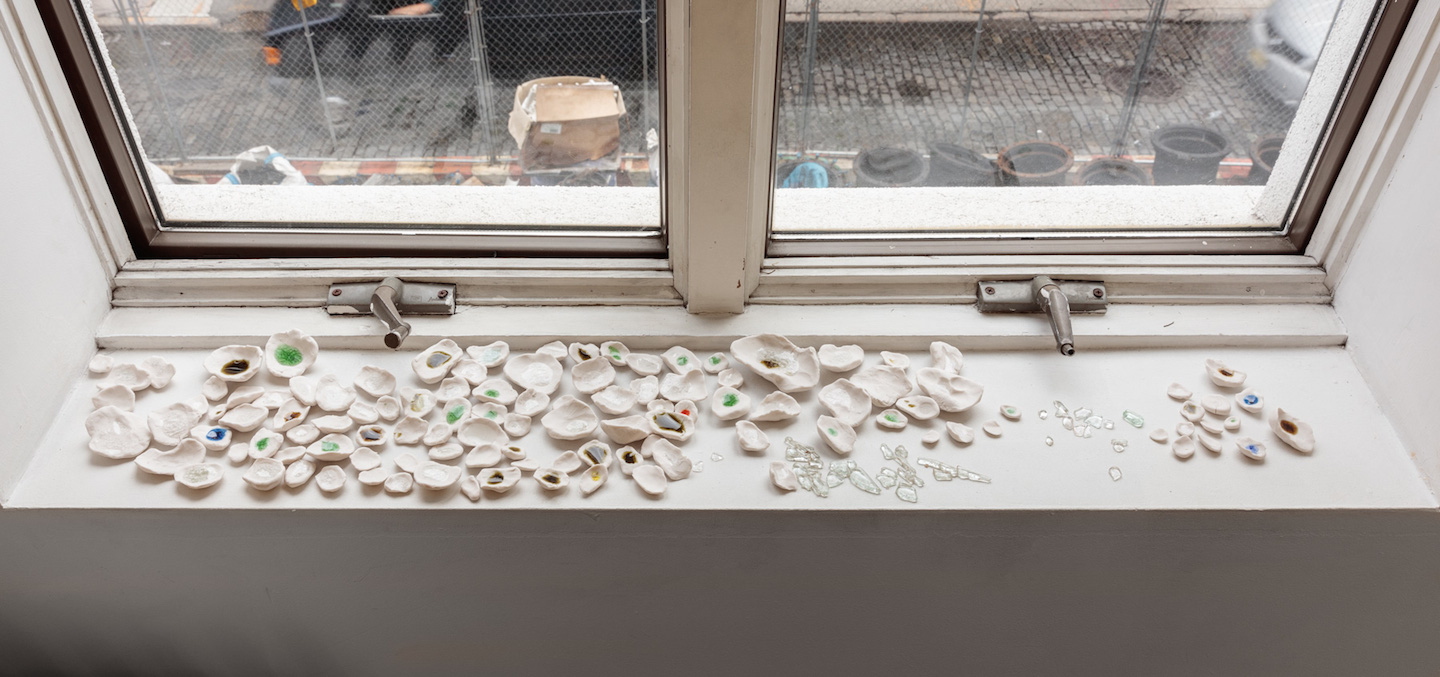  Kate Newby,  What’s the worst that can happen 2 , 2018, Porcelain, found glass from sidewalks, Dimensions variable 