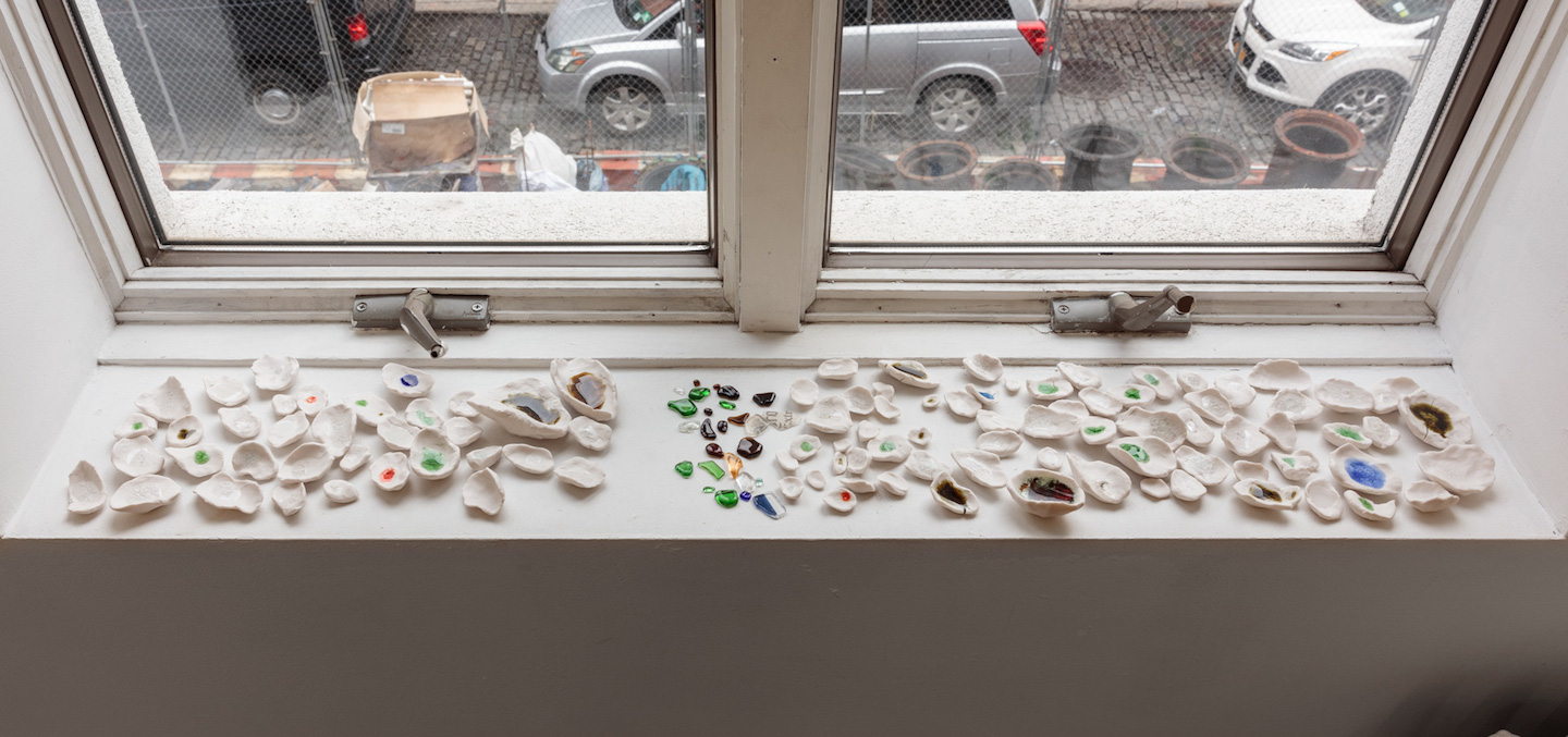  Kate Newby,  What’s the worst that can happen 3 , 2018, Porcelain, found glass from sidewalks, Dimensions variable 