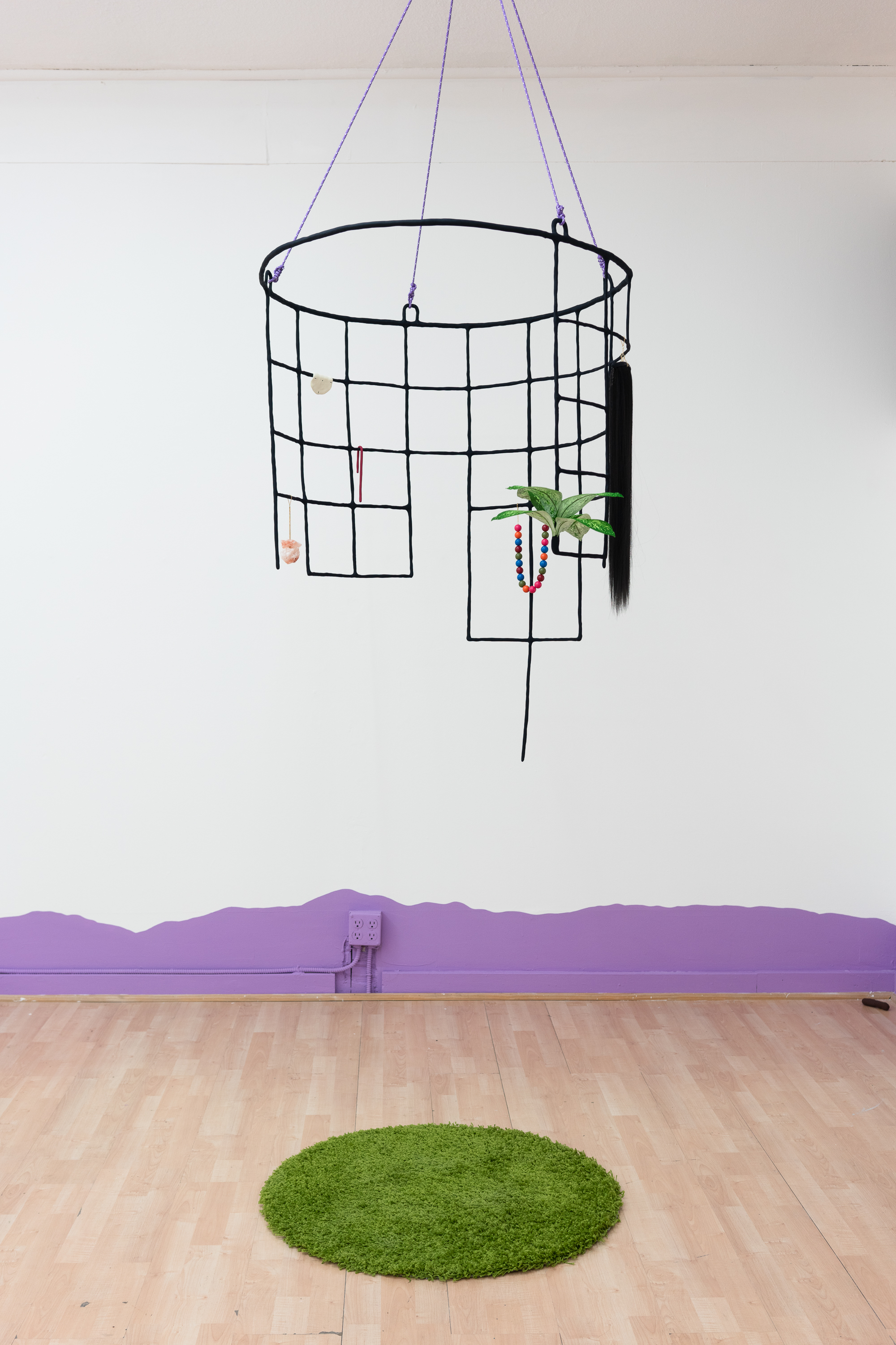  Stephanie Rohlfs,  Cage,  2018, Epoxy clay, paint, carpet, fake plant, fake hair, Himalayan salt crystals, plastic beads, chain, nylon cord, Dimensions variable 