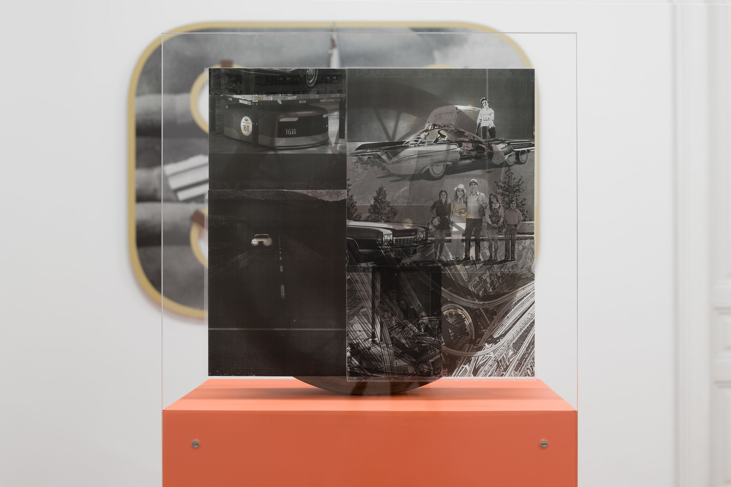  Alex Ito,  You Promised Catastrophe (Open Road),  2018, Ford Model-A wheel, wood, inkjet print on acetate, plexiglass, paint, 147 x 61 x 41 cm 