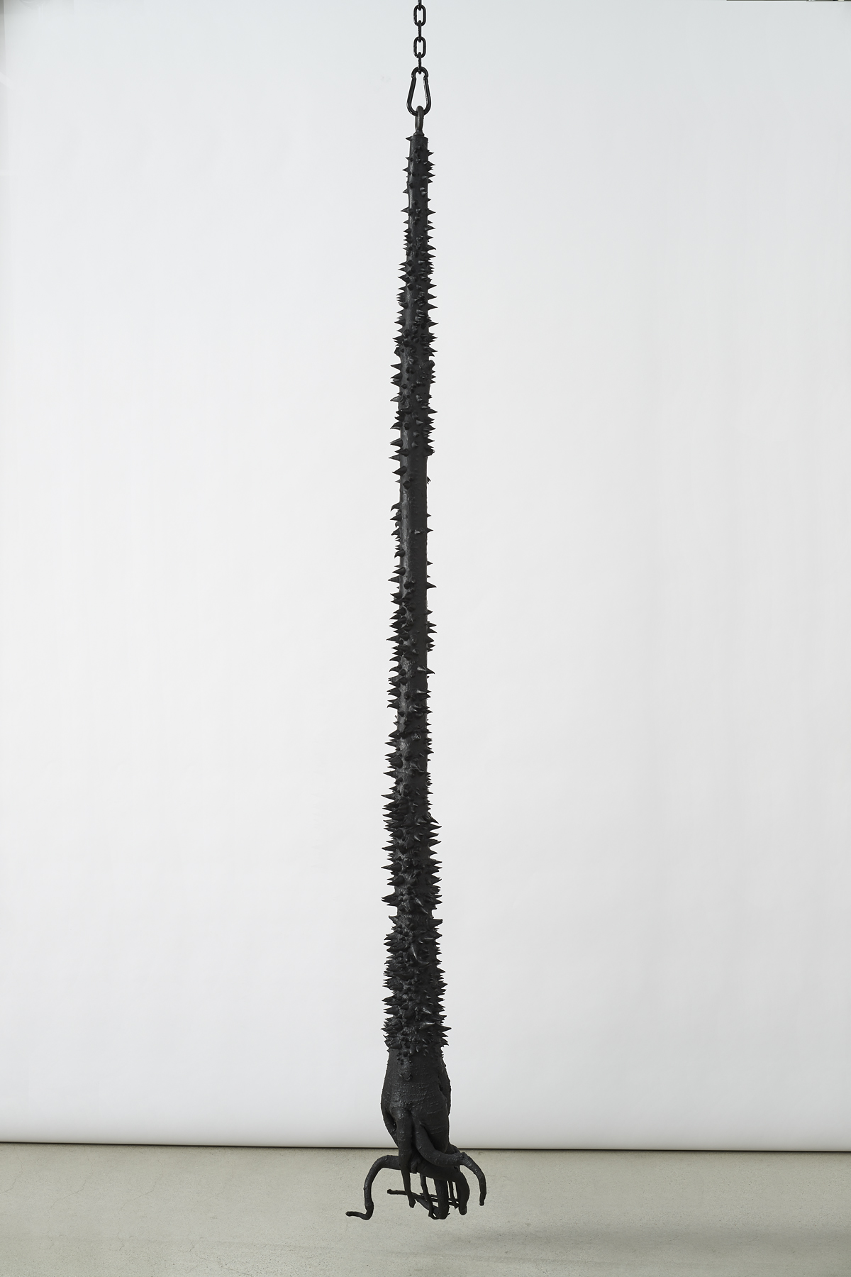  Davina Semo,  Homegrown , 2019, Patinated cast bronze, powder-coated chain, hardware, Trunk: 90 inches / 228.6 cm tall, overall dimensions variable 