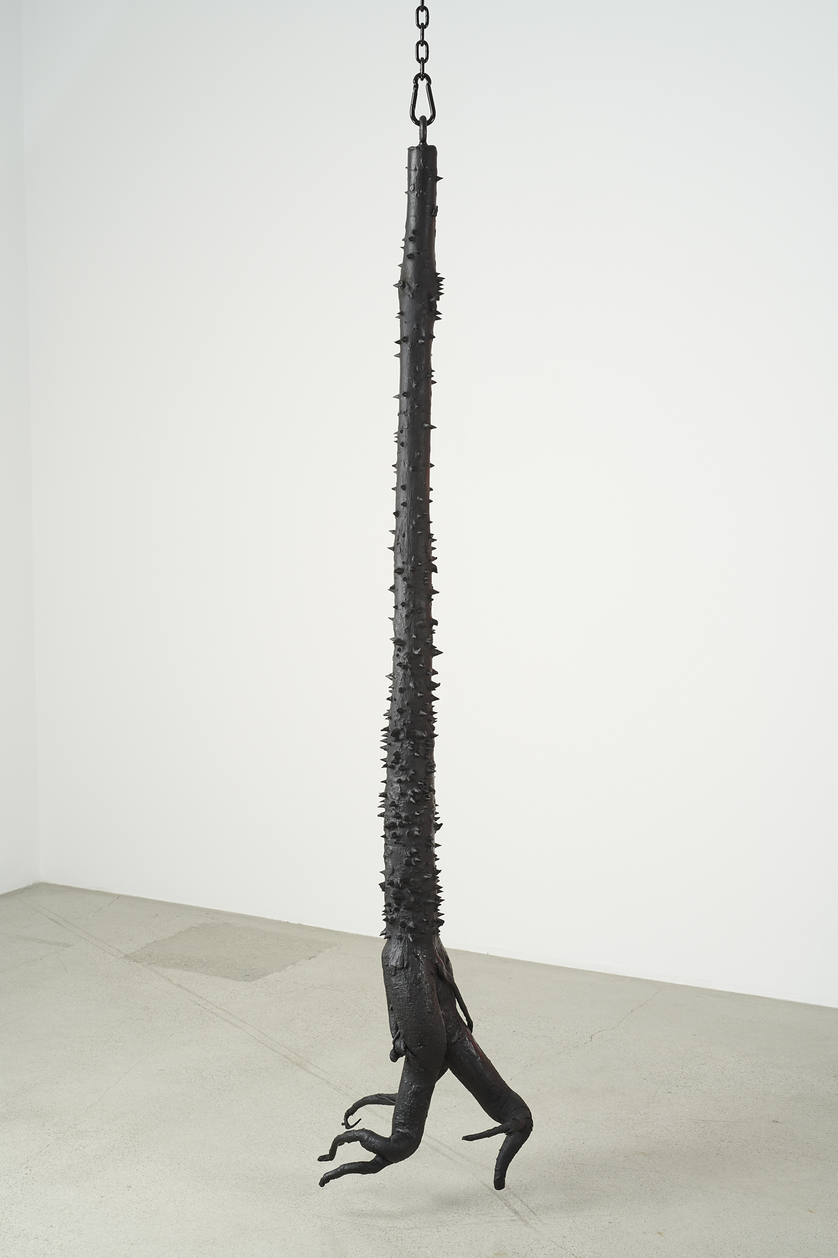 Davina Semo,  Muse , 2019, Patinated cast bronze, powder-coated chain, hardware Trunk: 81 inches / 205.74 cm tall, overall dimensions variable 