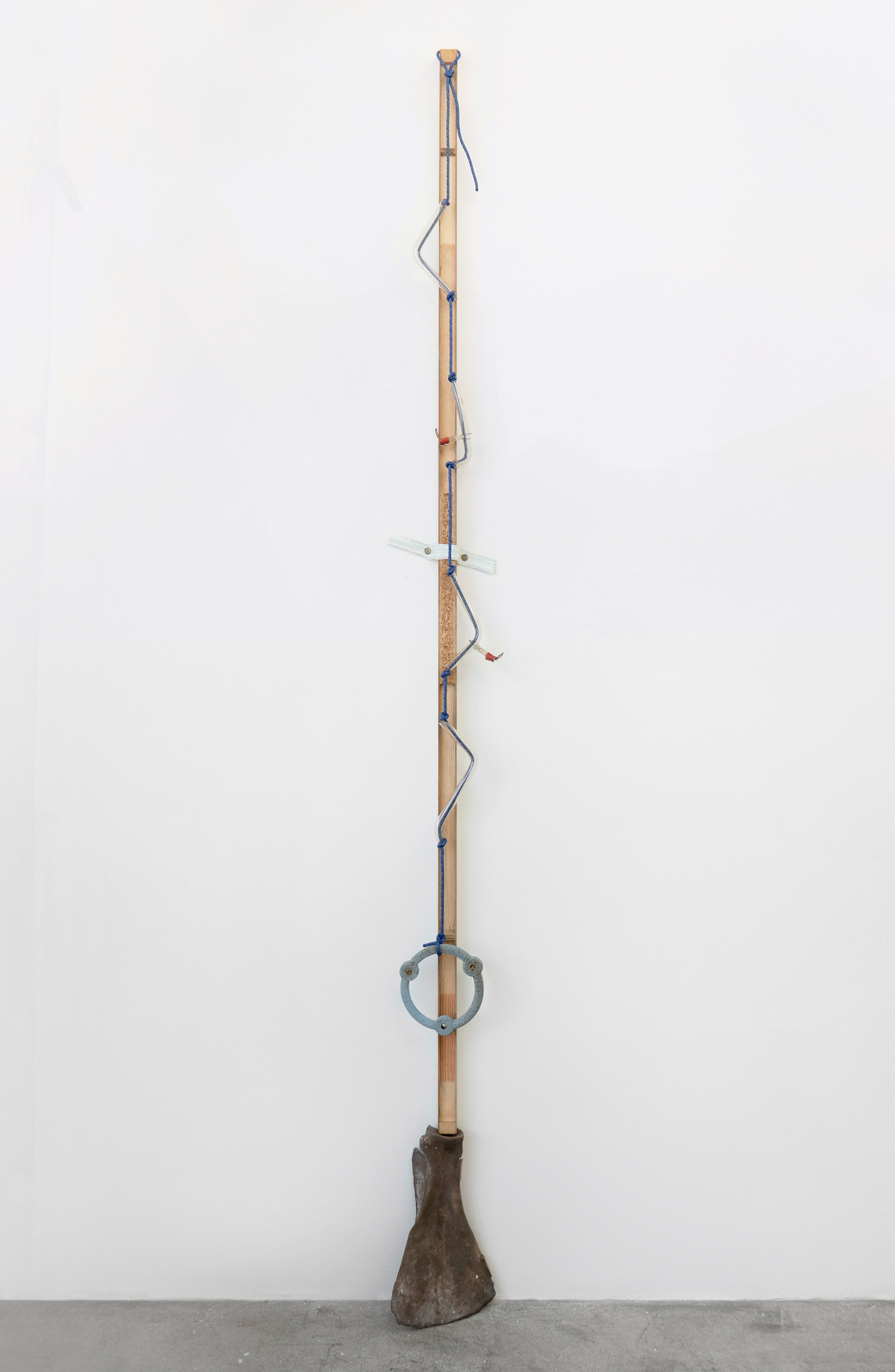  Matt Siegel,  E , 2018, Raw bronze, hollow core door, accessory cord, neon glass tubing (sourced: abandoned China Buffet, Evanston, WY), found object, fire, 92 x 8 x 5 in 