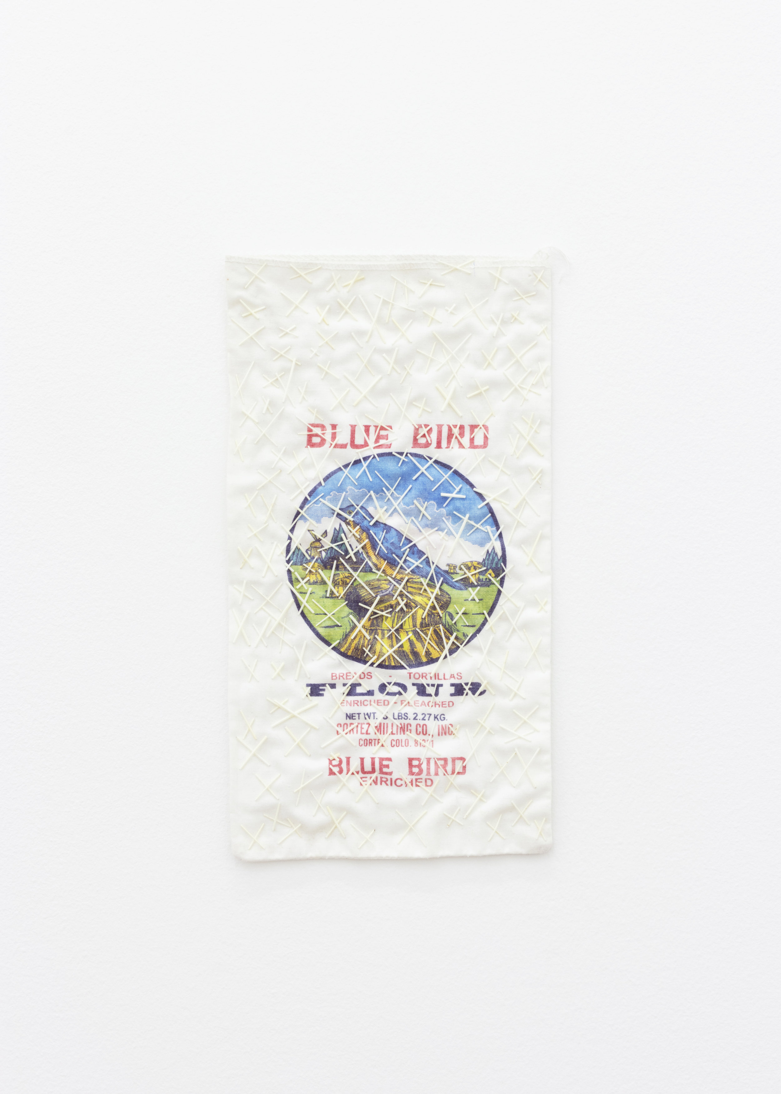   ... his x mark , 2019, Blue Bird Flour Bag, porcupine quills, thread, 15 x 8 in. 